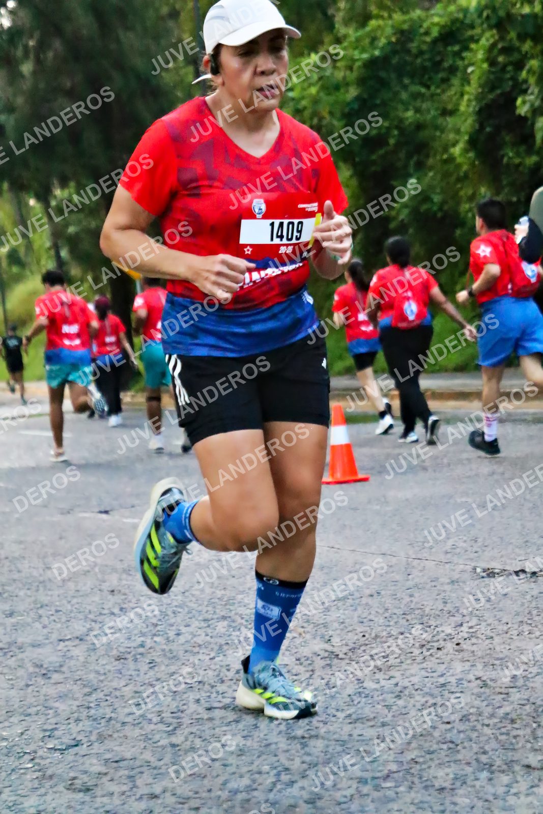 Foto de la CARRERA BIMBO GLOBAL RACE GUADALAJARA en Centro Comercial Andares, Blvd. Puerta de Hierro 4965, Zapopan a las 04:56 · dorsal 1409