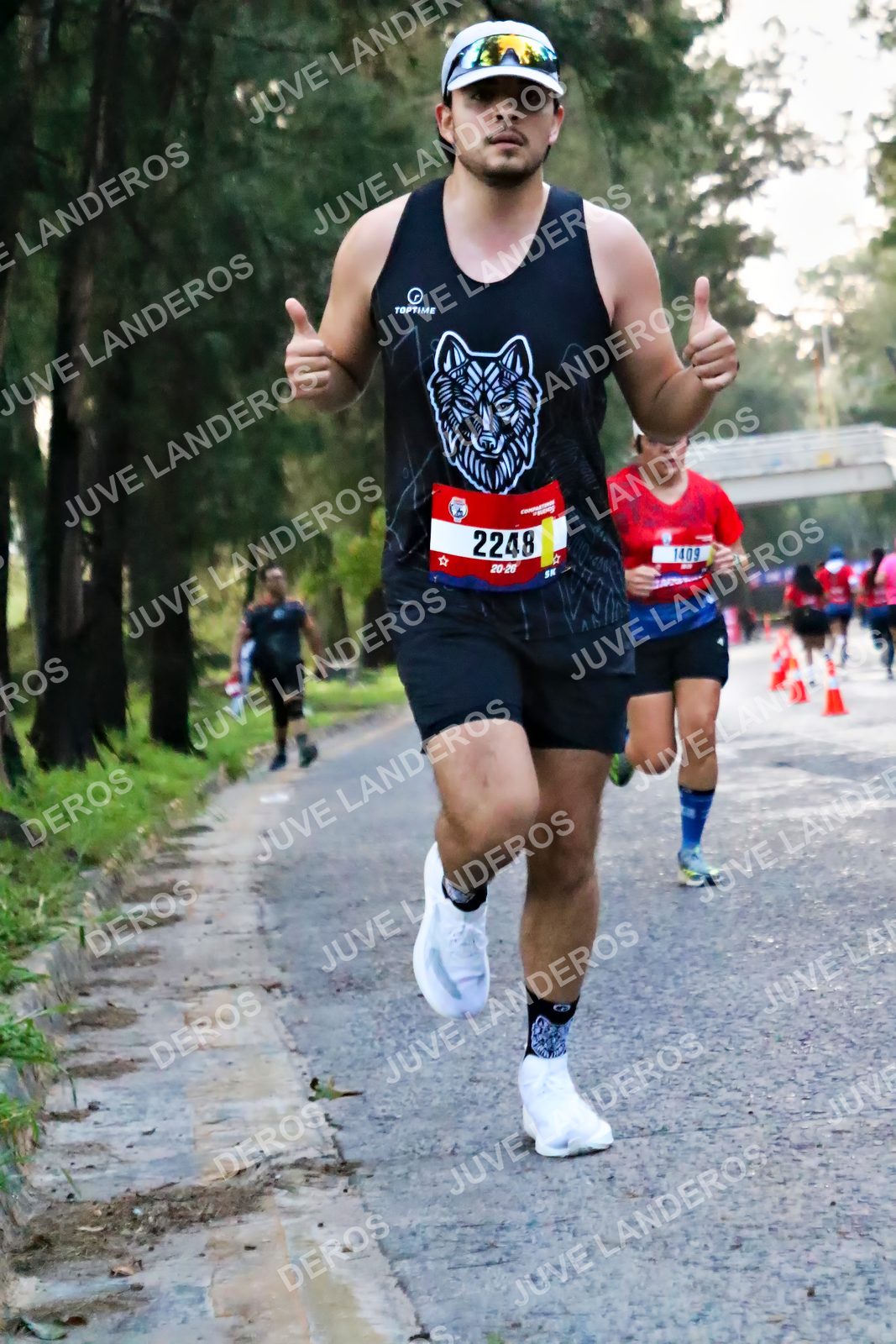 Foto de la CARRERA BIMBO GLOBAL RACE GUADALAJARA en Centro Comercial Andares, Blvd. Puerta de Hierro 4965, Zapopan a las 04:56 · dorsal 2248, 1409