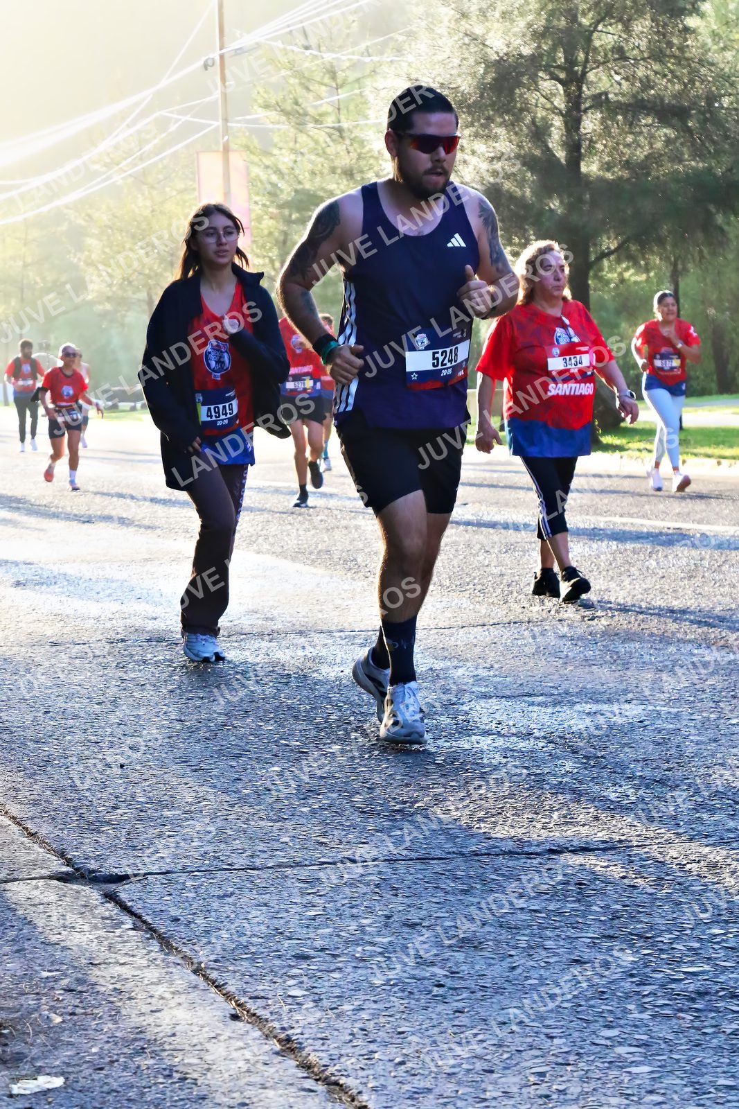 Foto de la CARRERA BIMBO GLOBAL RACE GUADALAJARA en Centro Comercial Andares, Blvd. Puerta de Hierro 4965, Zapopan a las 07:26 · dorsal 5248, 4949, 3434