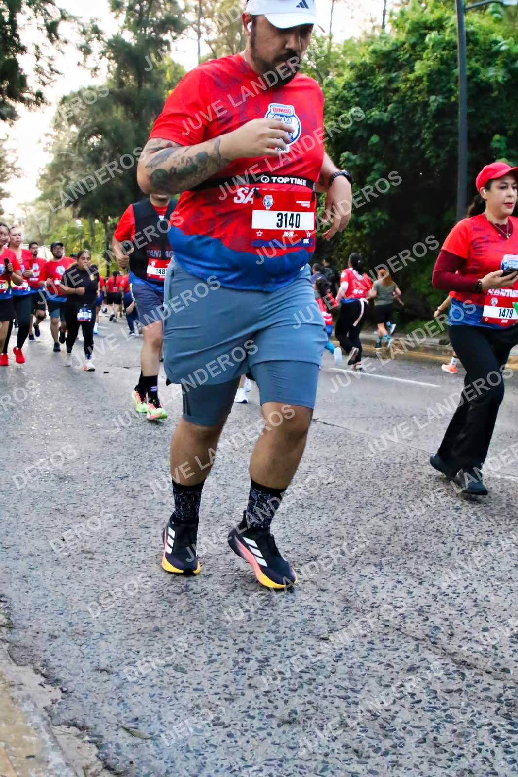 Foto de la CARRERA BIMBO GLOBAL RACE GUADALAJARA en Centro Comercial Andares, Blvd. Puerta de Hierro 4965, Zapopan a las 07:00 · dorsal 3140, 1479, 148