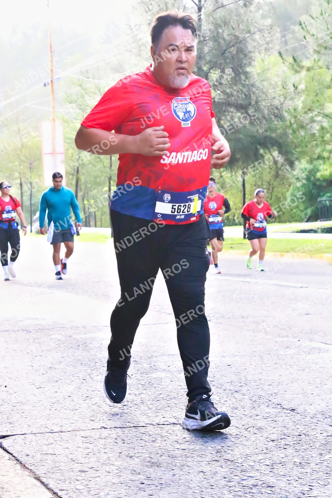 Foto de la CARRERA BIMBO GLOBAL RACE GUADALAJARA en Centro Comercial Andares, Blvd. Puerta de Hierro 4965, Zapopan a las 07:48 · dorsal 5628