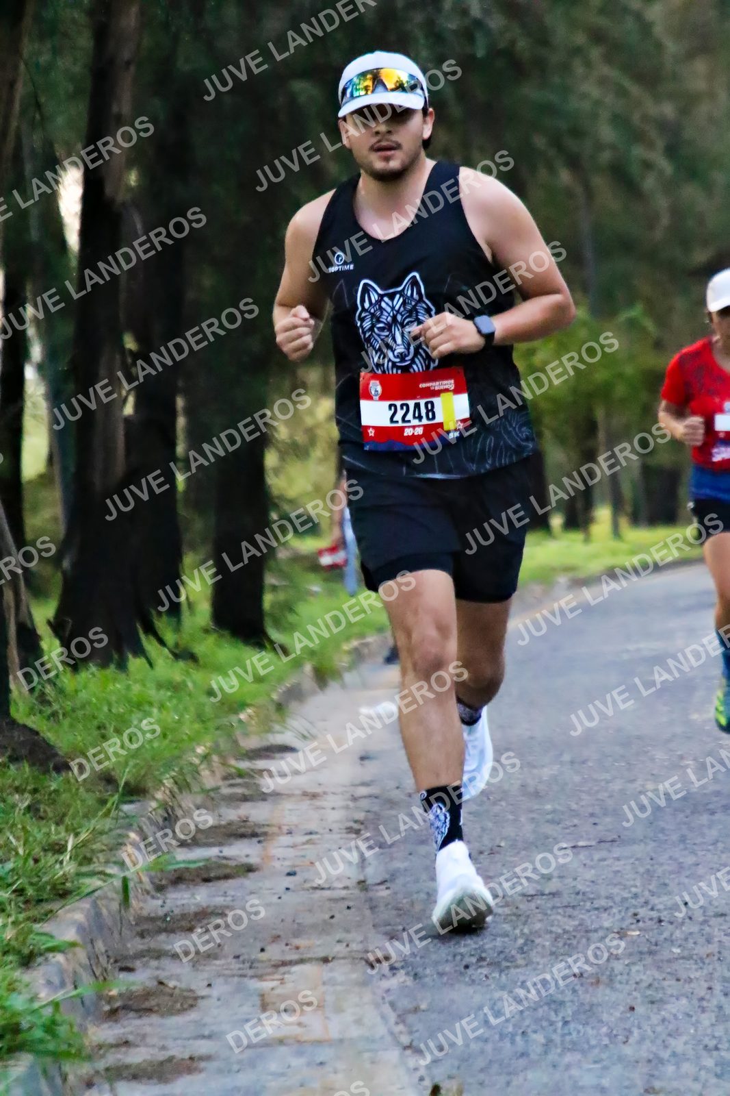 Foto de la CARRERA BIMBO GLOBAL RACE GUADALAJARA en Centro Comercial Andares, Blvd. Puerta de Hierro 4965, Zapopan a las 04:56 · dorsal 2248