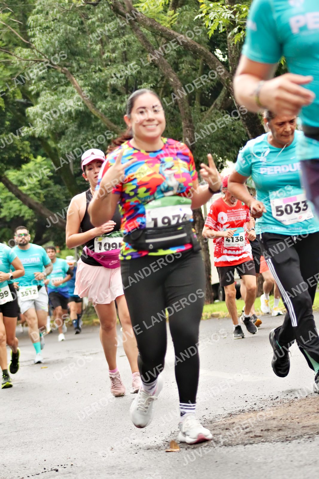 Foto del MEDIO MARATÓN ATLAS en Av. Patria, frente al Parque El Polvorín, Zapopan a las 08:36 · dorsal 5033, 3512, 4138, 99