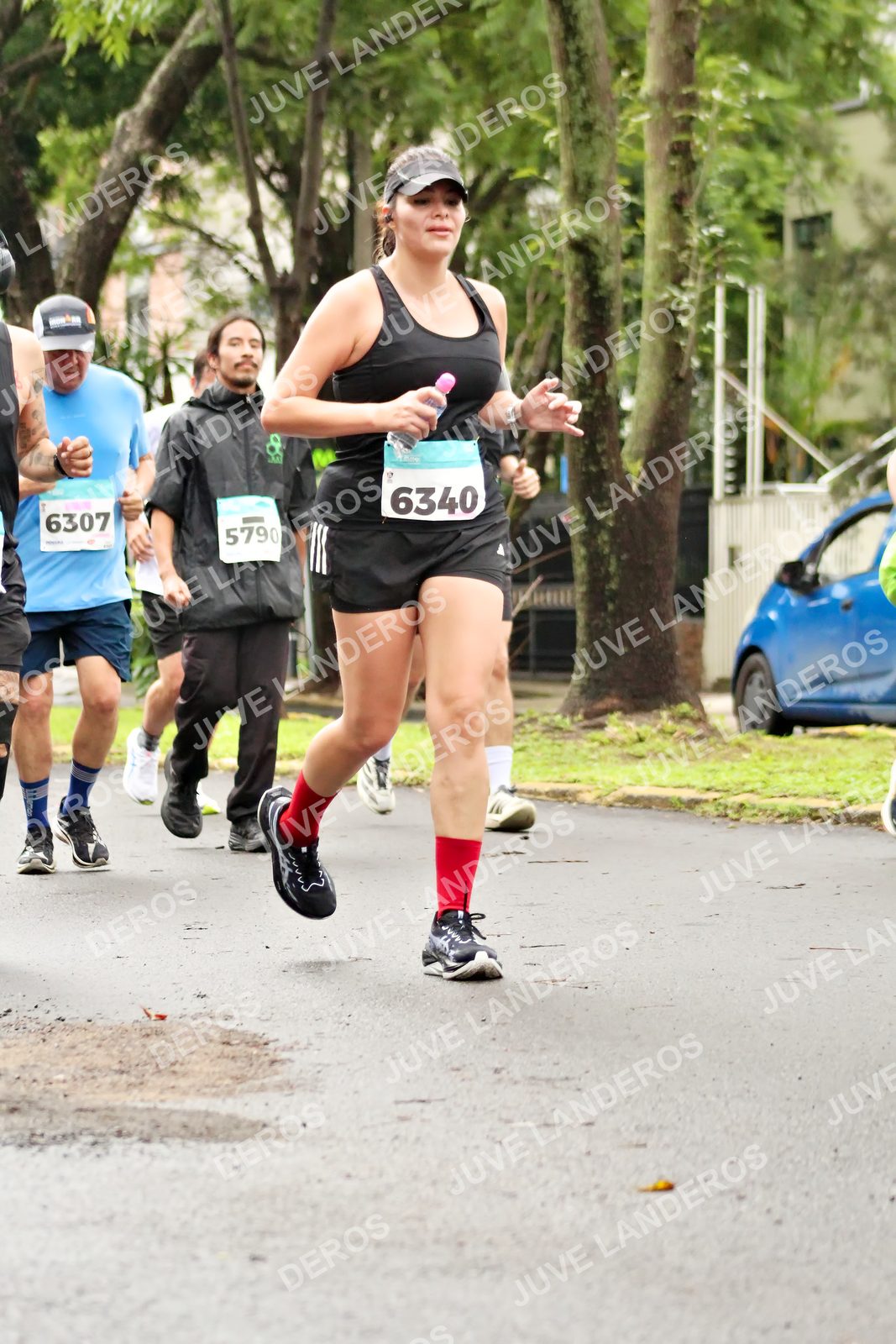 Foto del MEDIO MARATÓN ATLAS en Av. Patria, frente al Parque El Polvorín, Zapopan a las 08:37 · dorsal 6340, 6307, 5790