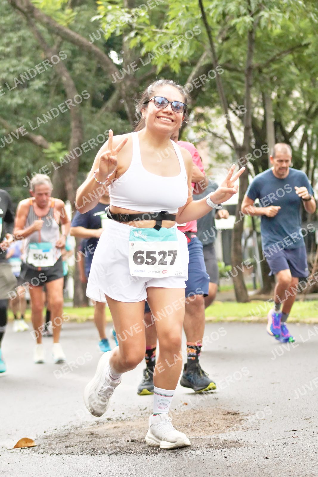 Foto del MEDIO MARATÓN ATLAS en Av. Patria, frente al Parque El Polvorín, Zapopan a las 08:35 · dorsal 6527, 504, 4527