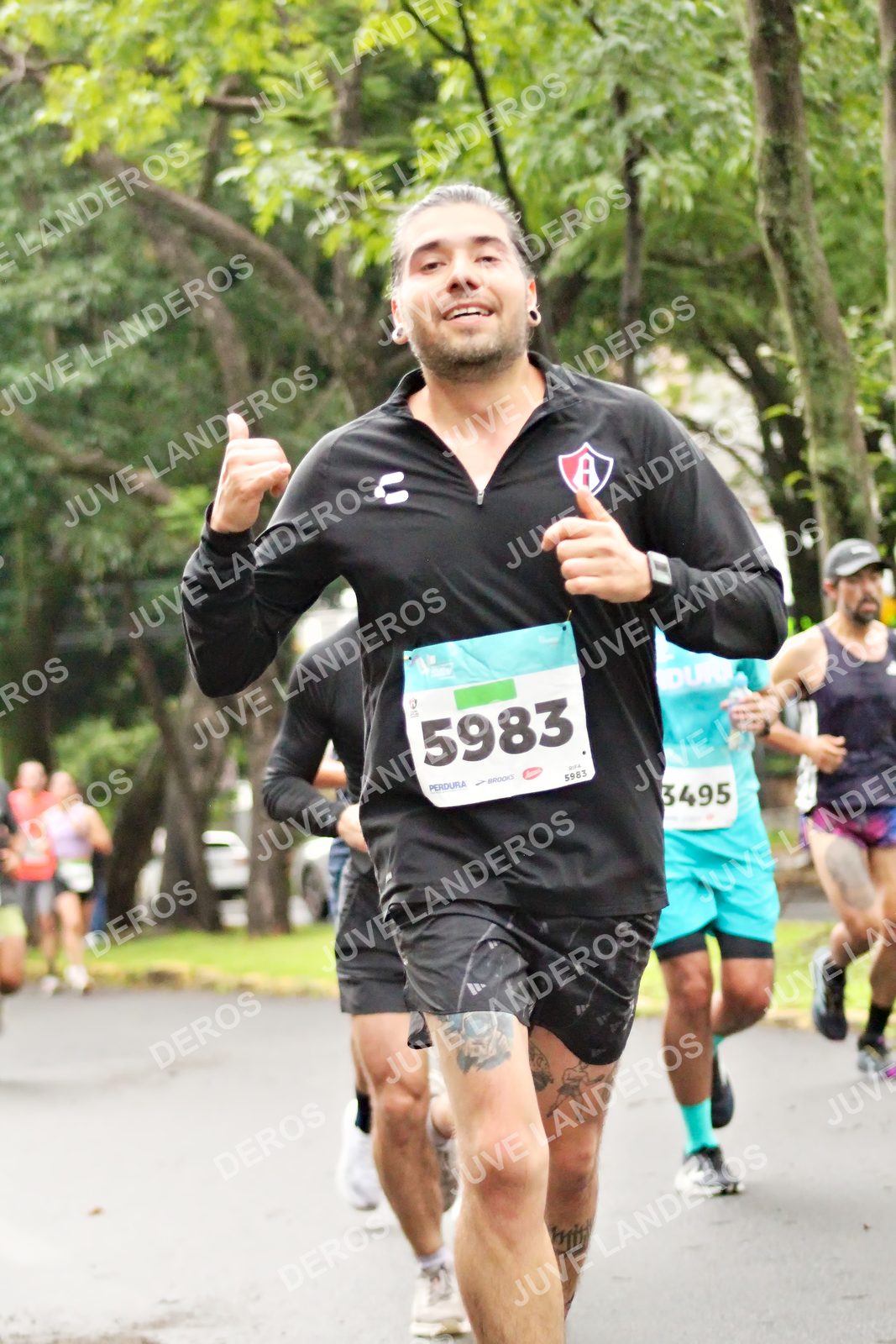 Foto del MEDIO MARATÓN ATLAS en Av. Patria, frente al Parque El Polvorín, Zapopan a las 08:13 · dorsal 5983, 3495