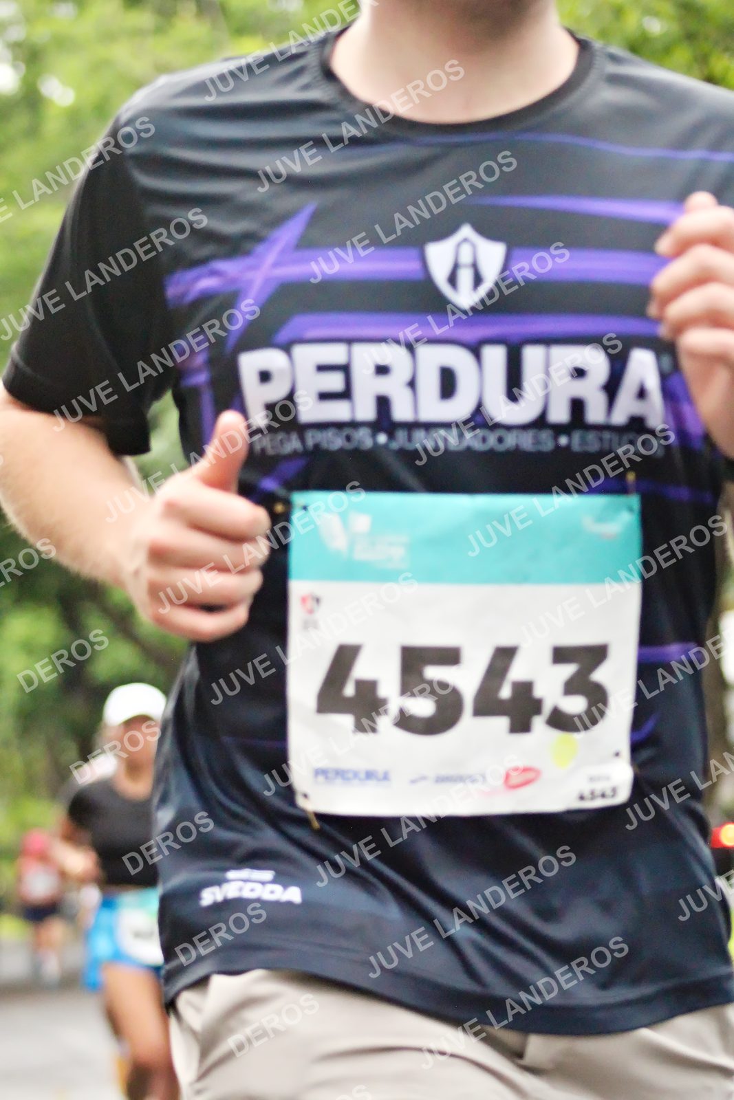 Foto del MEDIO MARATÓN ATLAS en Av. Patria, frente al Parque El Polvorín, Zapopan a las 08:16 · dorsal 4543
