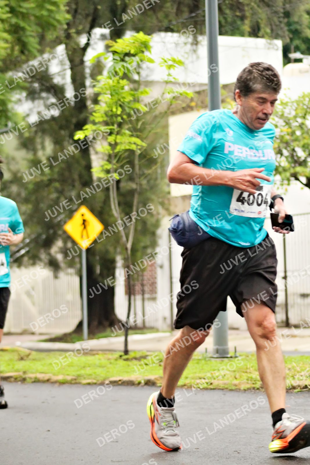 Foto del MEDIO MARATÓN ATLAS en Av. Patria, frente al Parque El Polvorín, Zapopan a las 08:22 · dorsal 4004