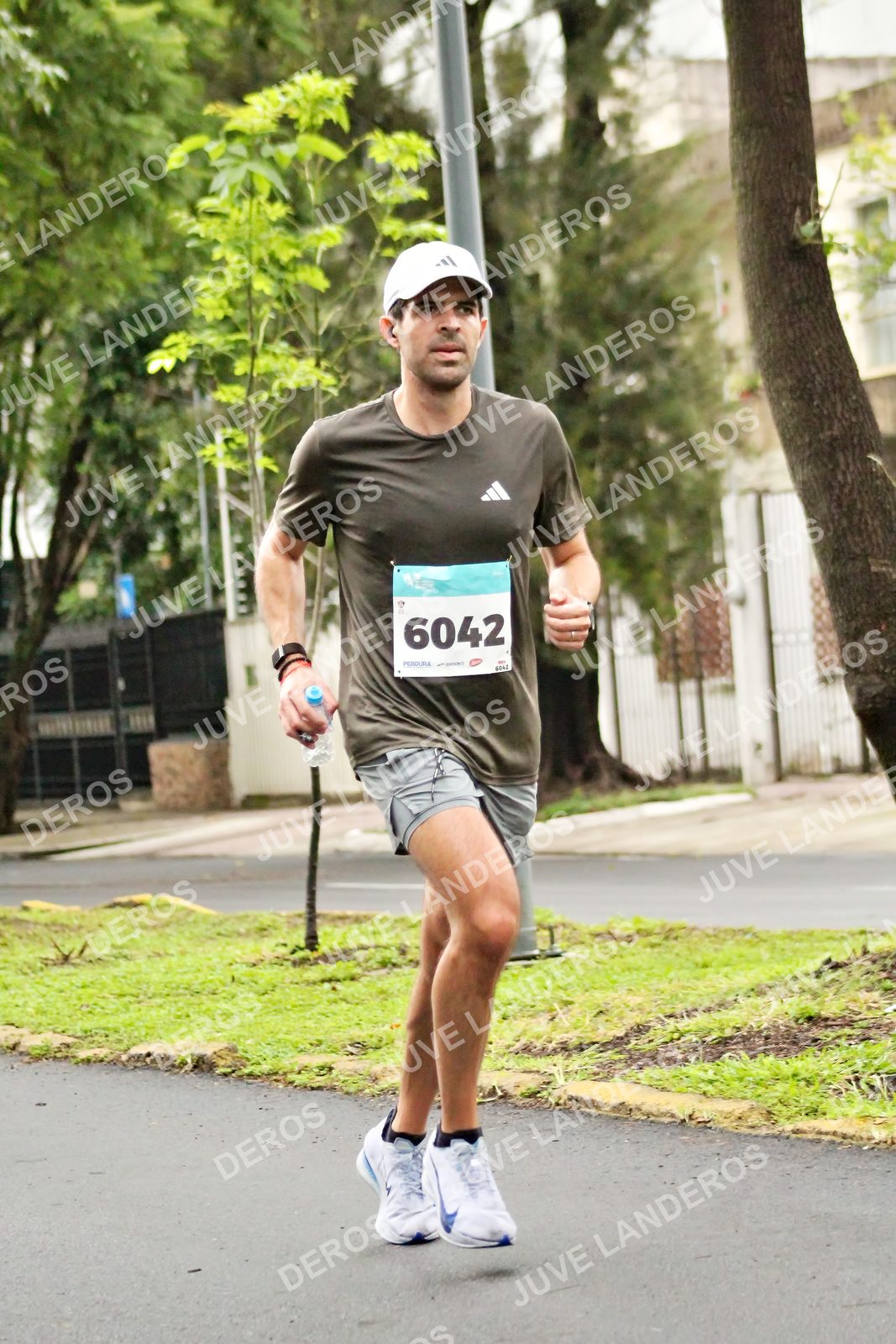 Foto del MEDIO MARATÓN ATLAS en Av. Patria, frente al Parque El Polvorín, Zapopan a las 08:07 · dorsal 6042