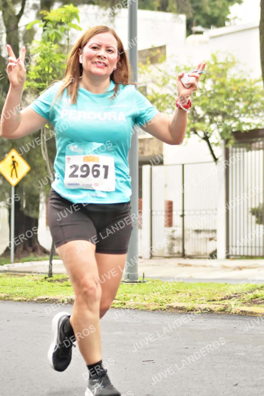 Foto del MEDIO MARATÓN ATLAS en Av. Patria, frente al Parque El Polvorín, Zapopan a las 08:39 · dorsal 2961