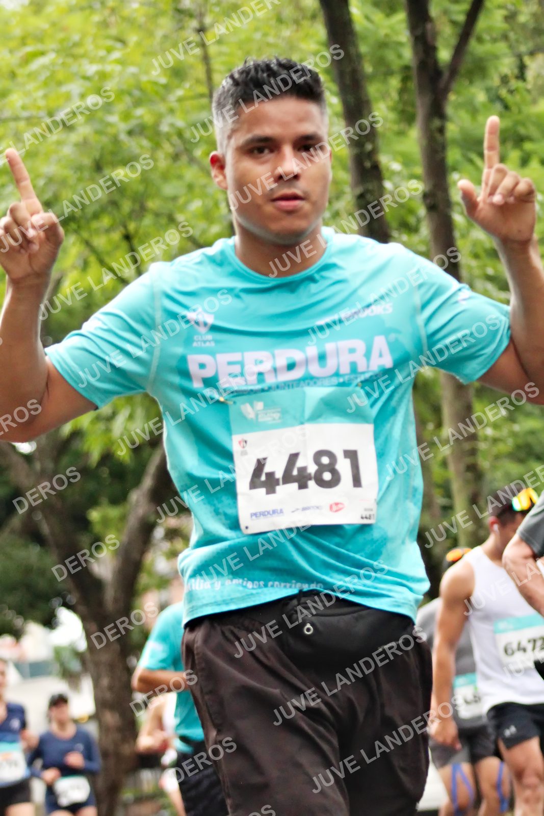Foto del MEDIO MARATÓN ATLAS en Av. Patria, frente al Parque El Polvorín, Zapopan a las 08:25 · dorsal 4481, 6472
