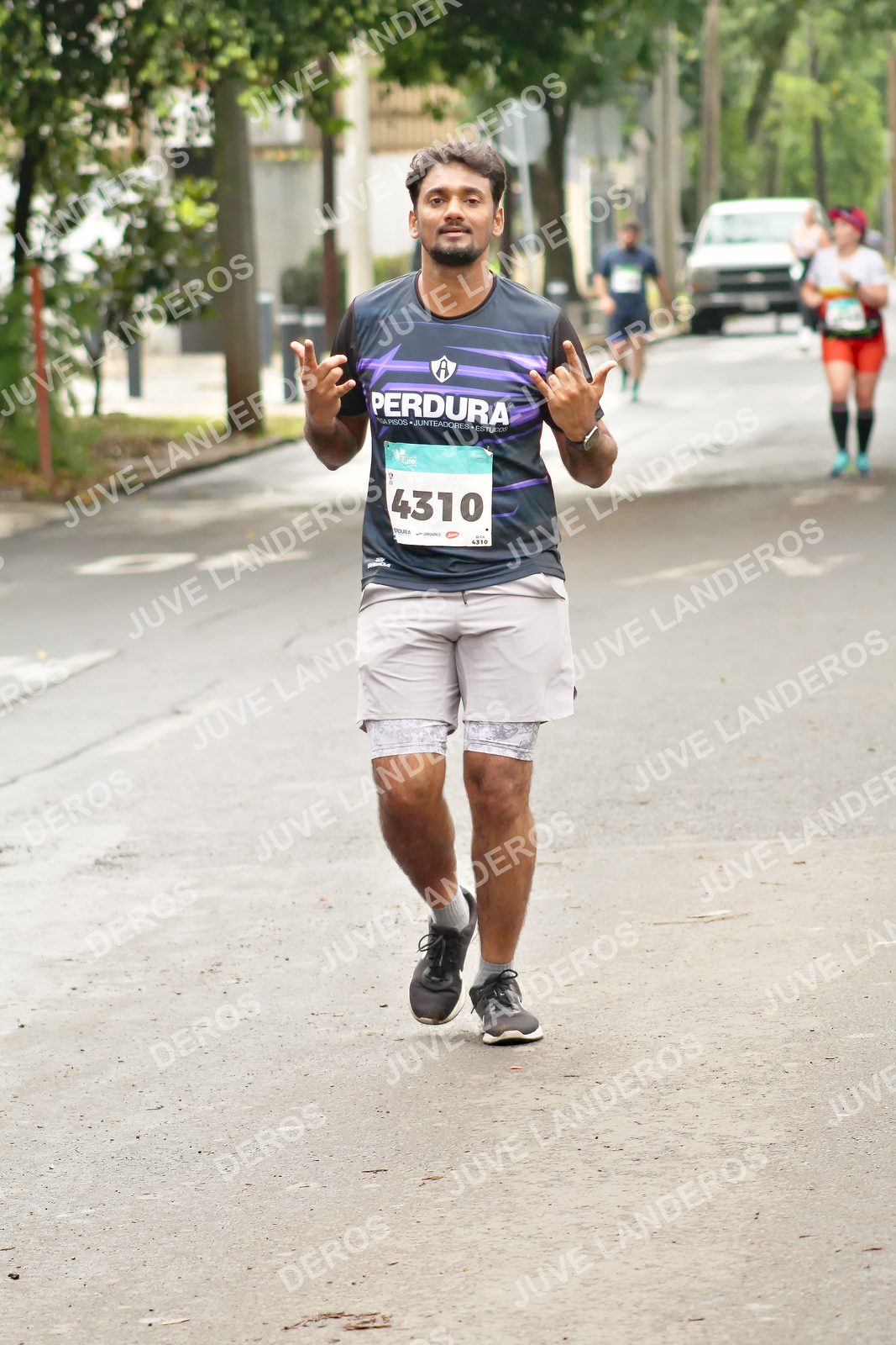 Foto del MEDIO MARATÓN ATLAS en Av. Patria, frente al Parque El Polvorín, Zapopan a las 09:06 · dorsal 4310