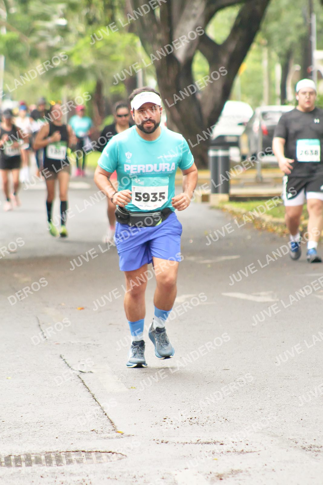 Foto del MEDIO MARATÓN ATLAS en Av. Patria, frente al Parque El Polvorín, Zapopan a las 08:55 · dorsal 5935