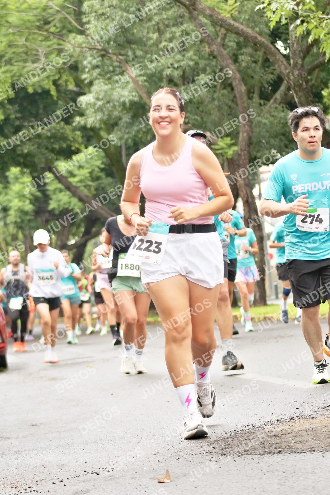 Foto del MEDIO MARATÓN ATLAS en Av. Patria, frente al Parque El Polvorín, Zapopan a las 08:42 · dorsal 274, 223, 1880, 3645