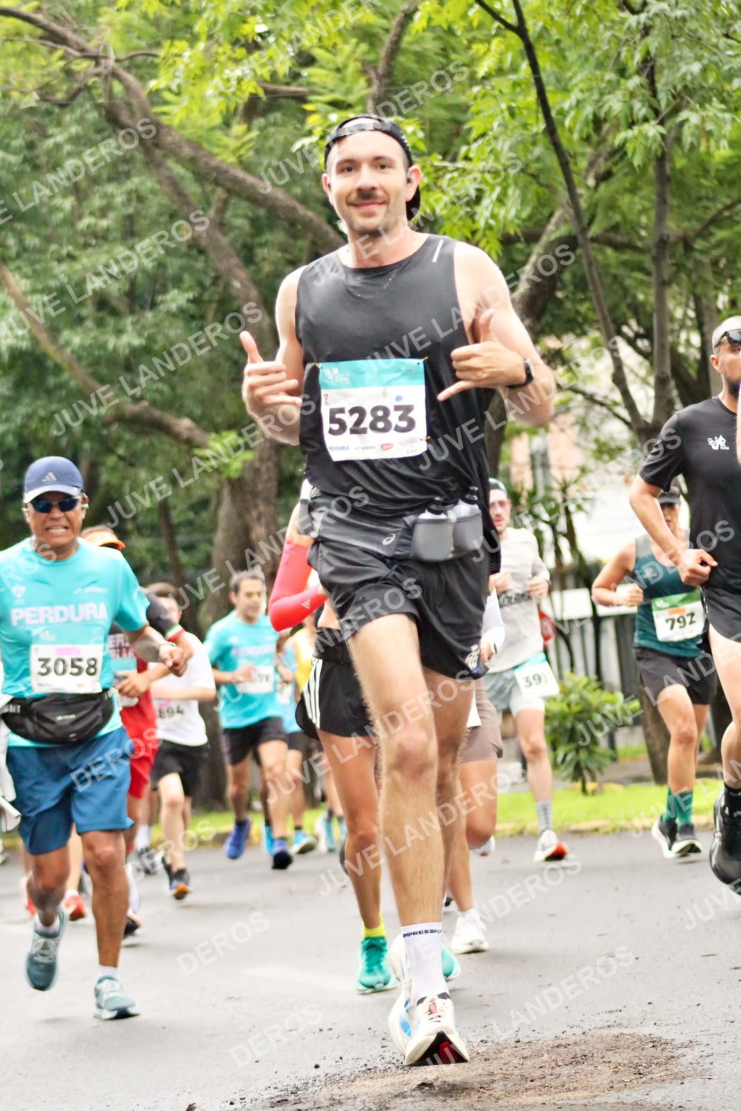 Foto del MEDIO MARATÓN ATLAS en Av. Patria, frente al Parque El Polvorín, Zapopan a las 08:22 · dorsal 5283, 3058, 39, 894