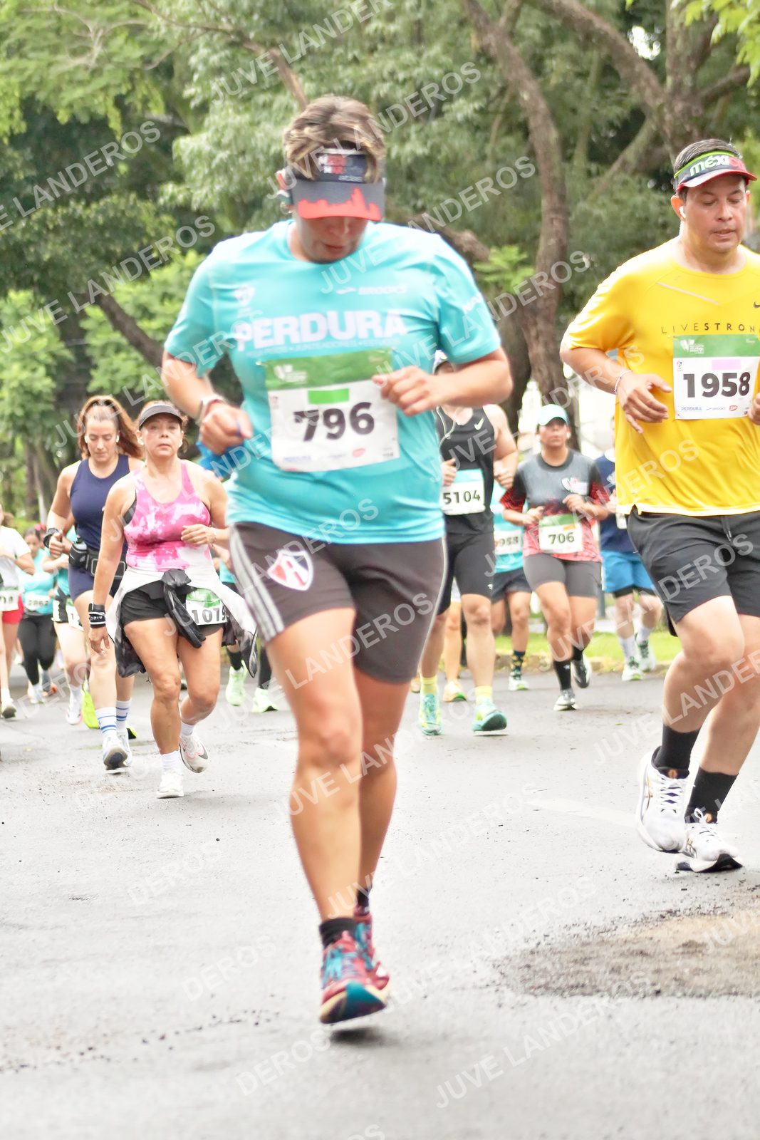 Foto del MEDIO MARATÓN ATLAS en Av. Patria, frente al Parque El Polvorín, Zapopan a las 08:43 · dorsal 796, 1958, 706, 5104
