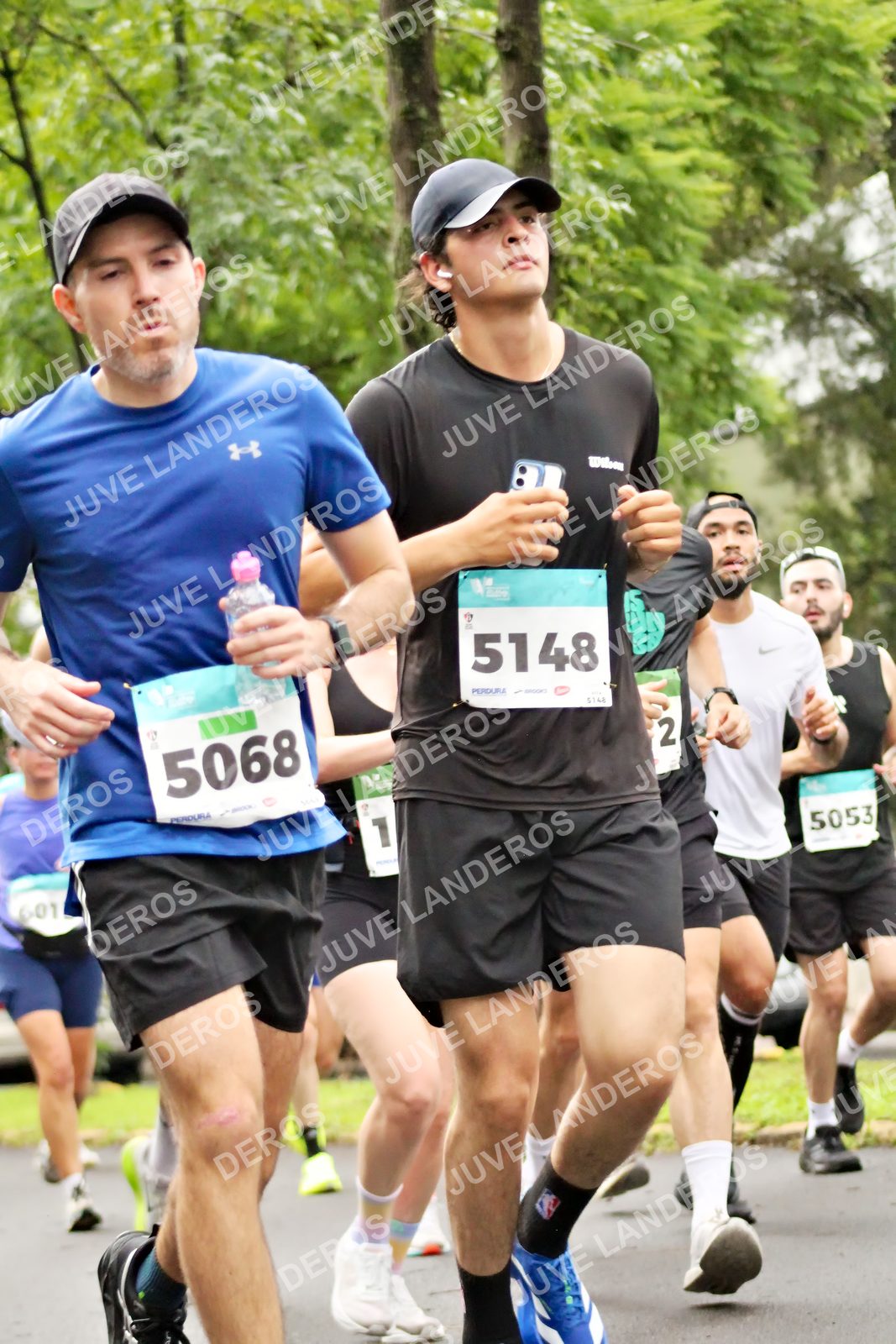 Foto del MEDIO MARATÓN ATLAS en Av. Patria, frente al Parque El Polvorín, Zapopan a las 08:26 · dorsal 5068, 5053, 5148, 2