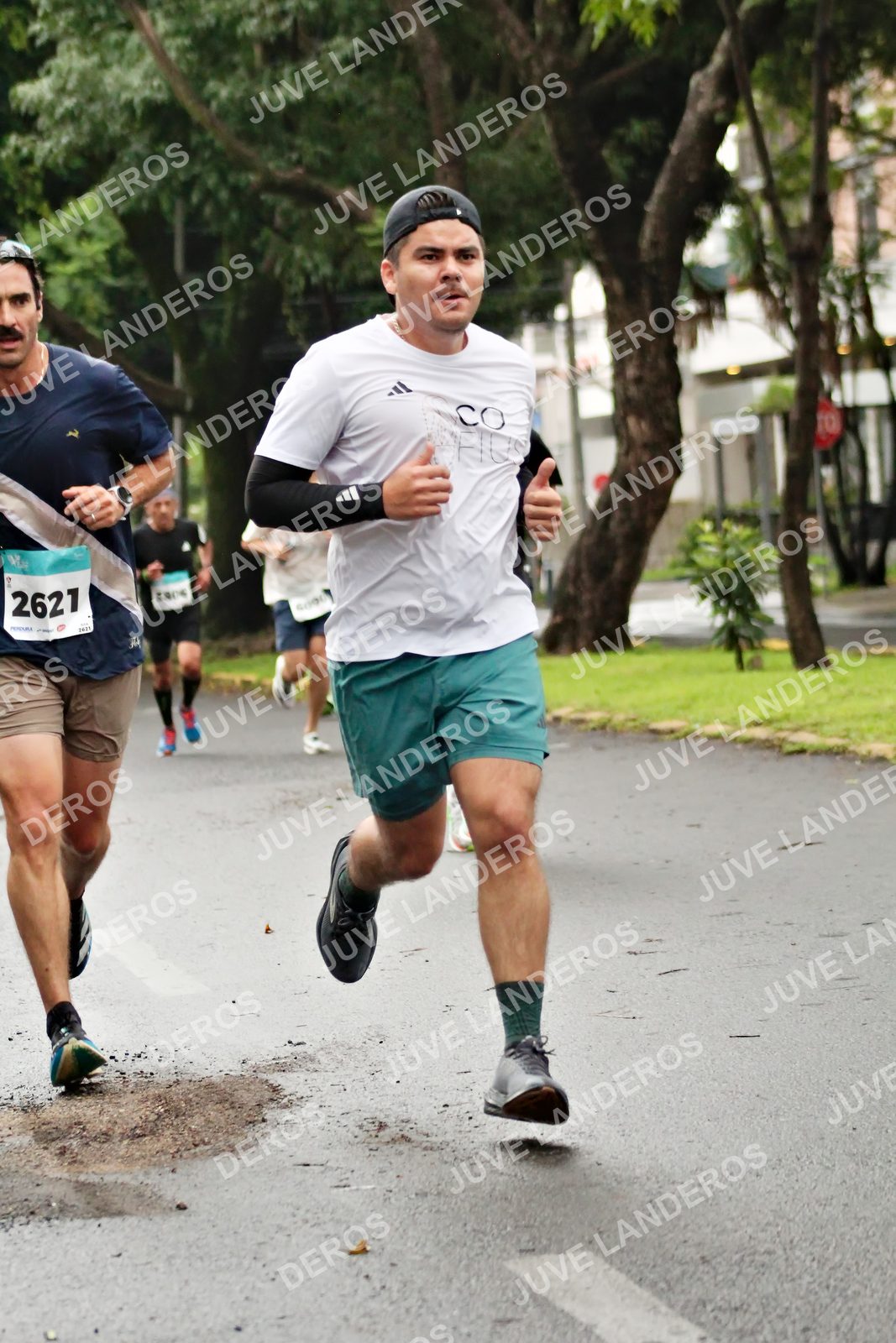 Foto del MEDIO MARATÓN ATLAS en Av. Patria, frente al Parque El Polvorín, Zapopan a las 08:09 · dorsal 2621