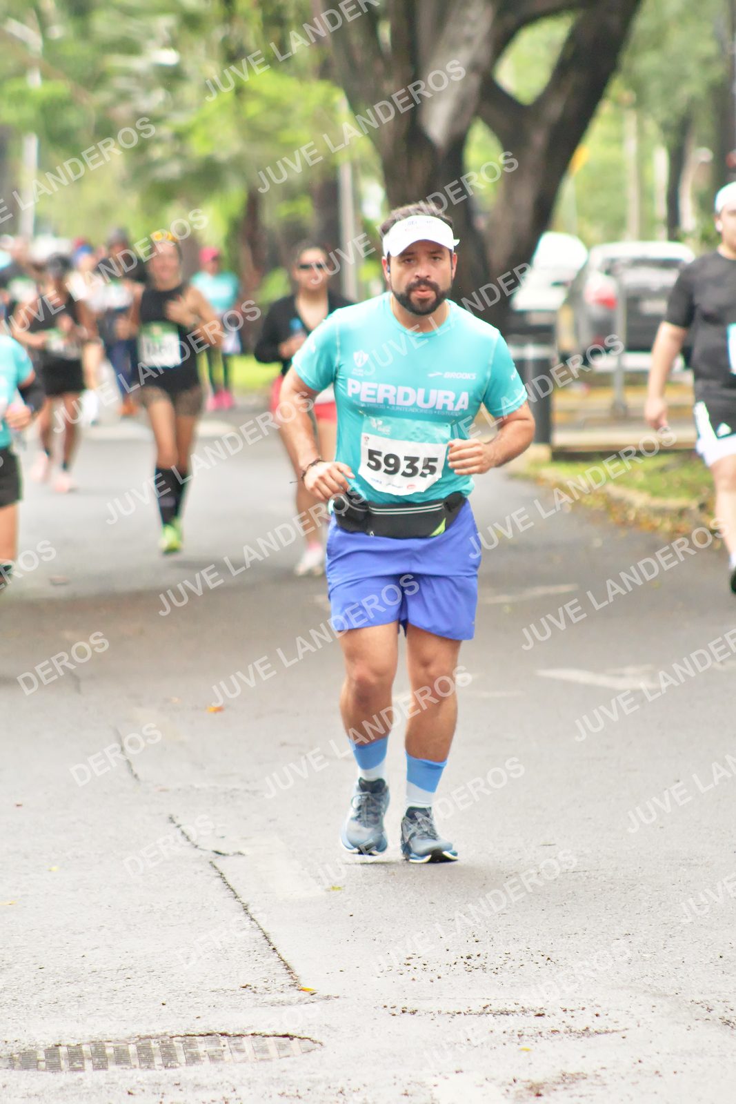 Foto del MEDIO MARATÓN ATLAS en Av. Patria, frente al Parque El Polvorín, Zapopan a las 08:55 · dorsal 5935