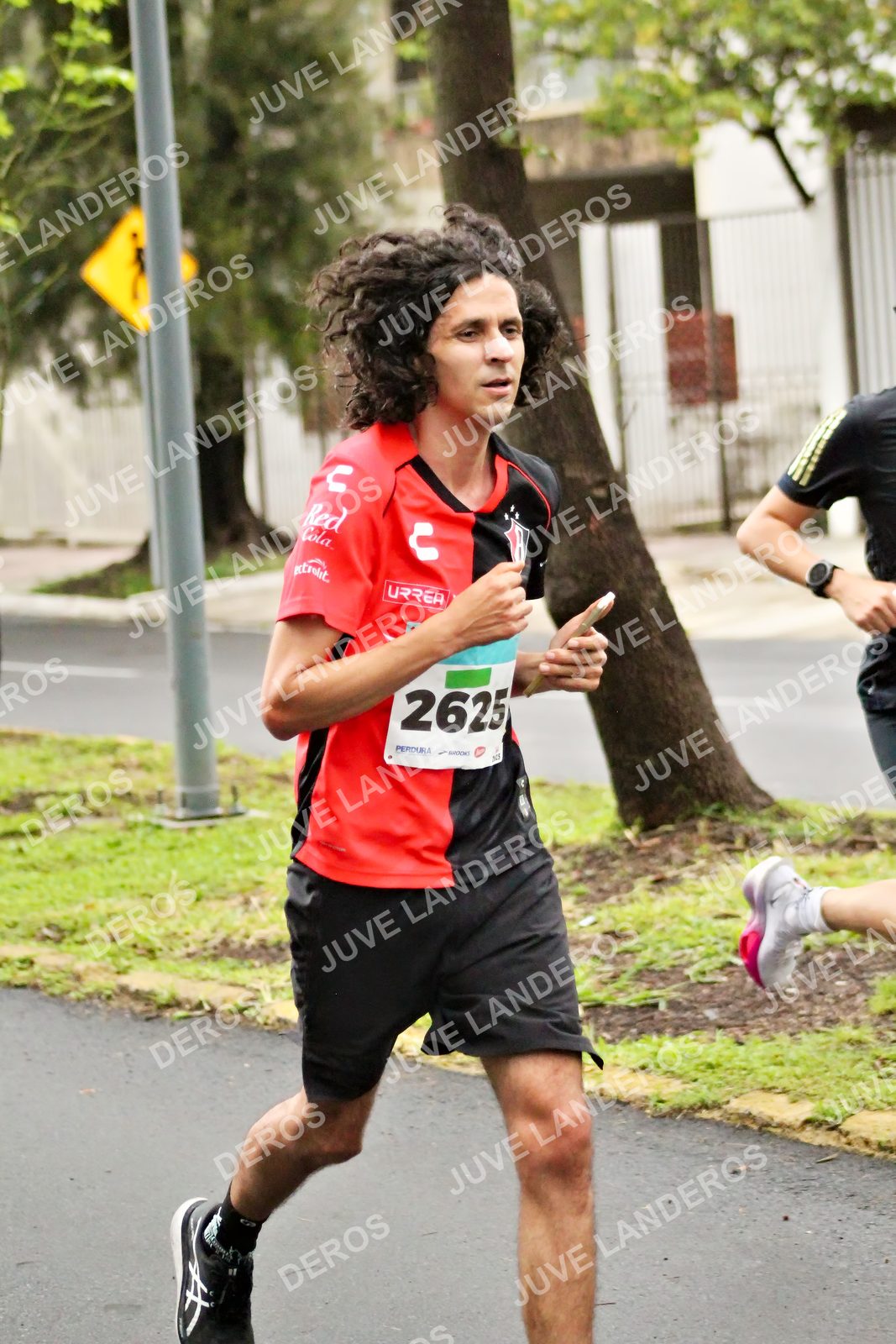 Foto del MEDIO MARATÓN ATLAS en Av. Patria, frente al Parque El Polvorín, Zapopan a las 08:03 · dorsal 2625