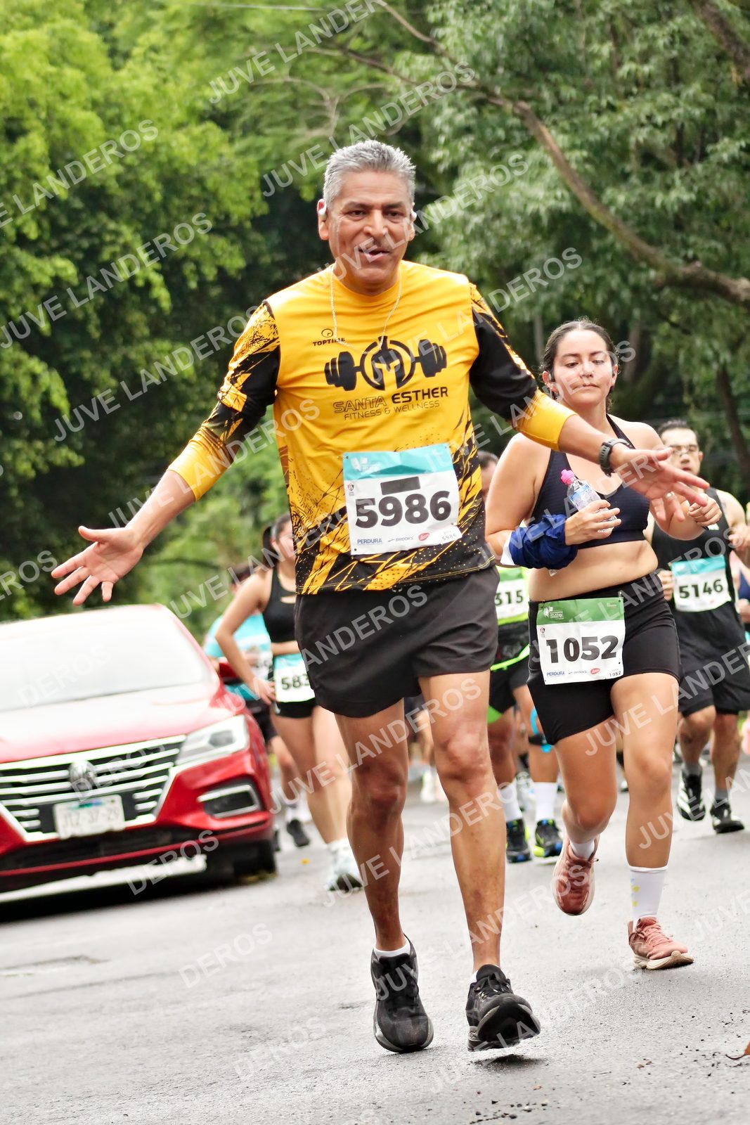 Foto del MEDIO MARATÓN ATLAS en Av. Patria, frente al Parque El Polvorín, Zapopan a las 08:34 · dorsal 5986, 1052, 5146, 315