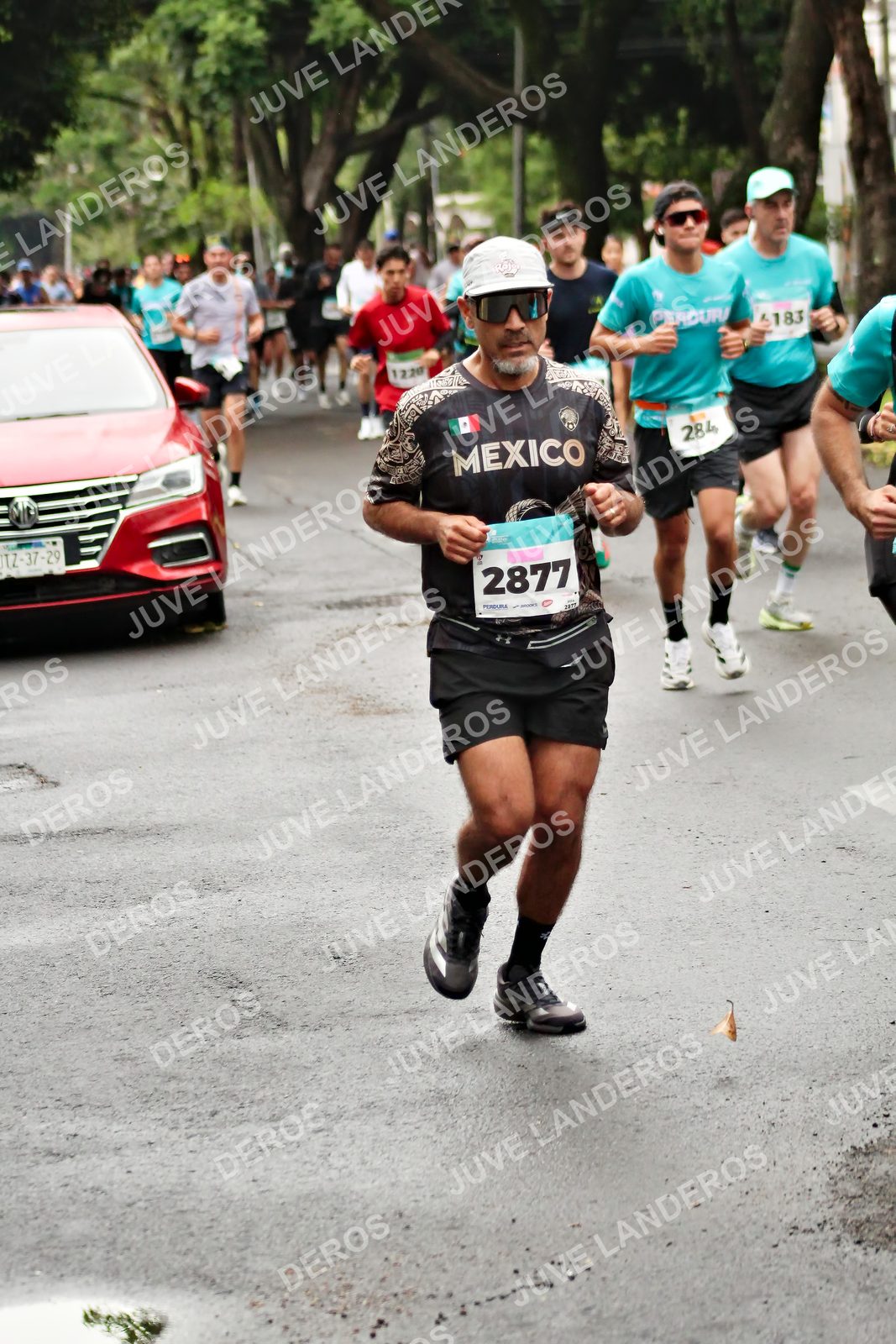 Foto del MEDIO MARATÓN ATLAS en Av. Patria, frente al Parque El Polvorín, Zapopan a las 08:20 · dorsal 2877, 284, 1220