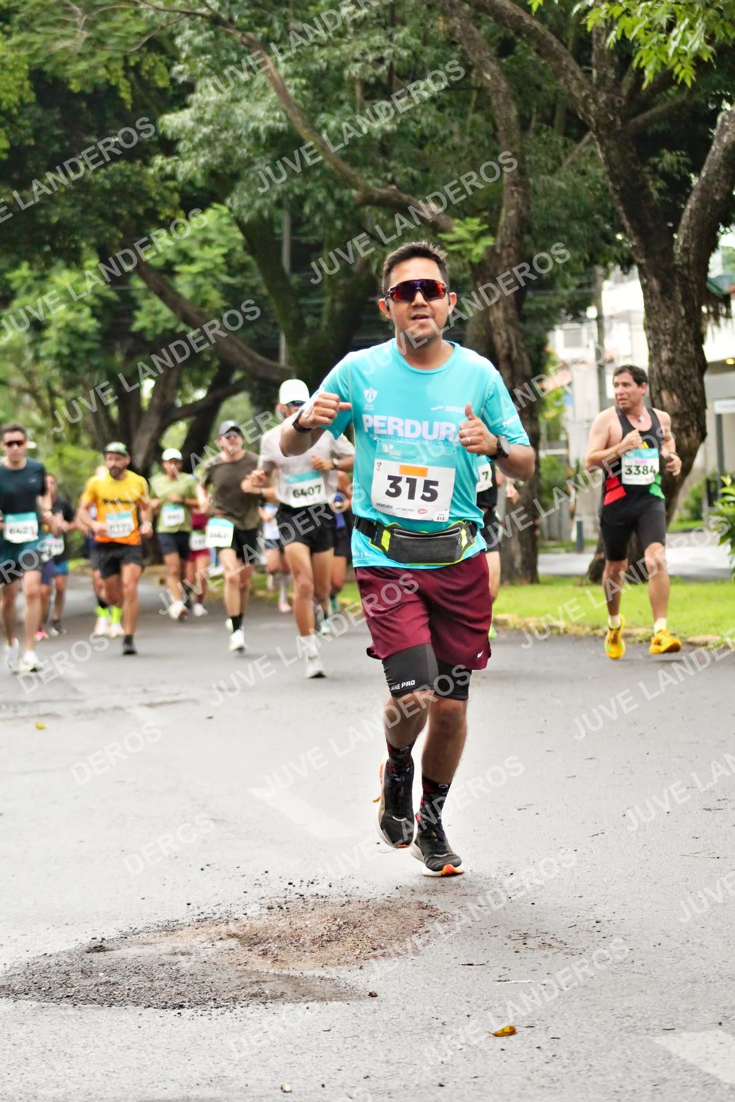 Foto del MEDIO MARATÓN ATLAS en Av. Patria, frente al Parque El Polvorín, Zapopan a las 08:13 · dorsal 315, 3384, 6407, 7