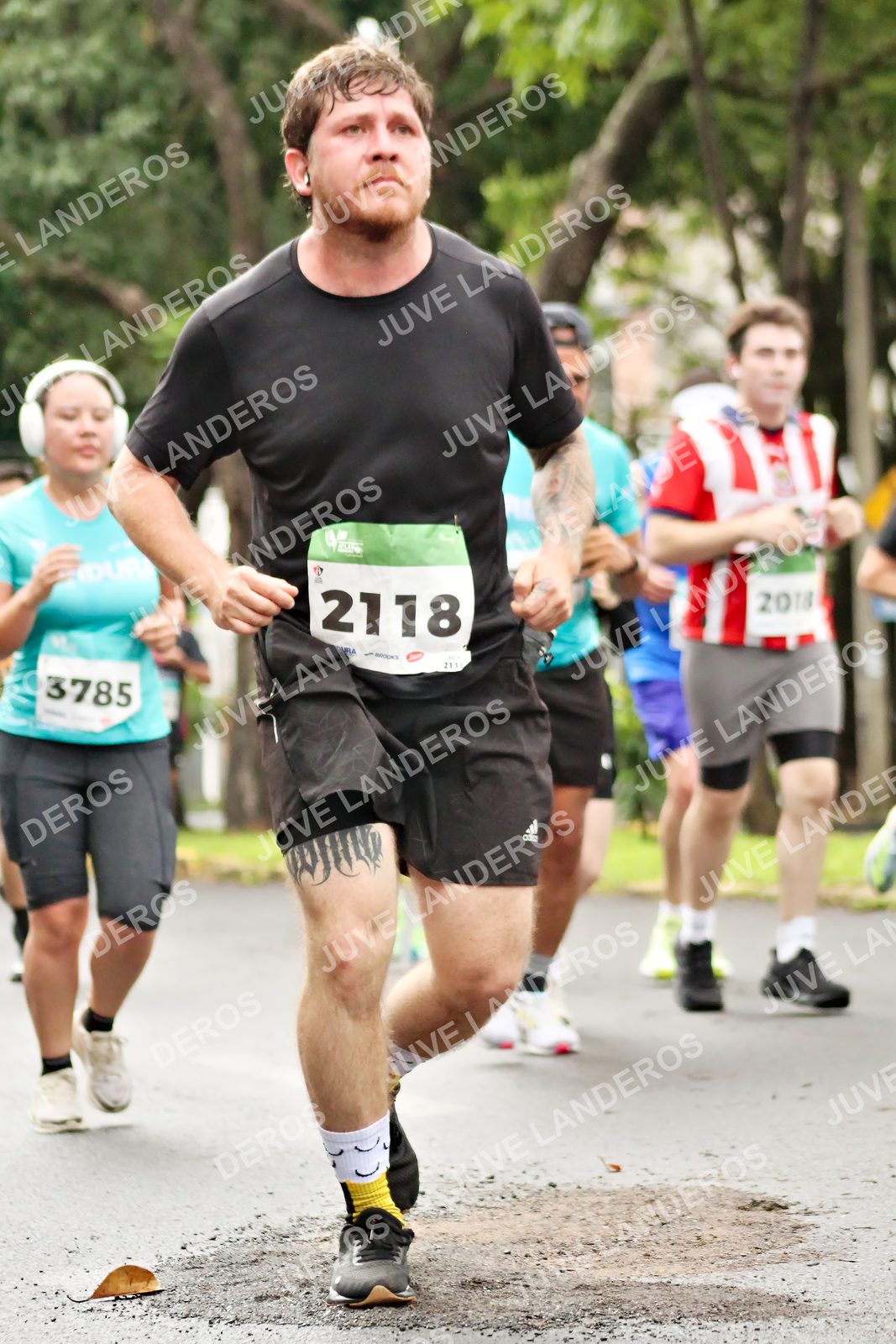 Foto del MEDIO MARATÓN ATLAS en Av. Patria, frente al Parque El Polvorín, Zapopan a las 08:35 · dorsal 2118, 3785, 2018, 211