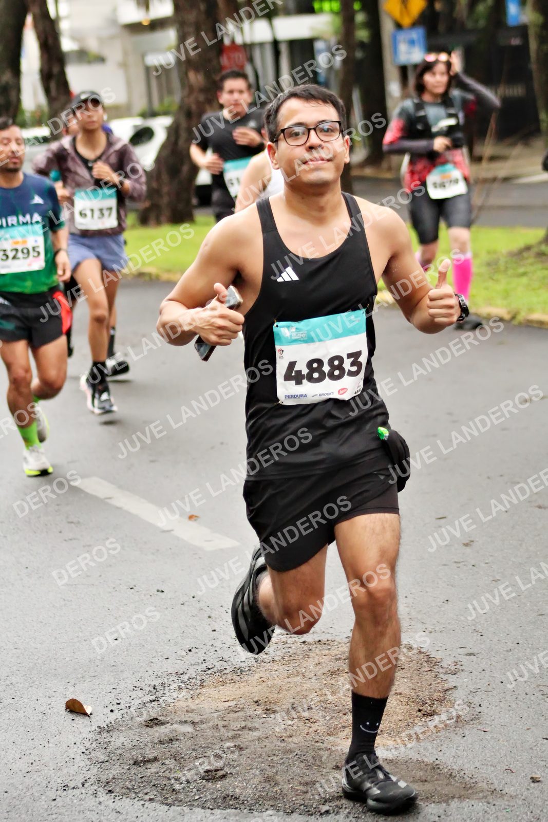 Foto del MEDIO MARATÓN ATLAS en Av. Patria, frente al Parque El Polvorín, Zapopan a las 08:20 · dorsal 4883, 3295, 6137