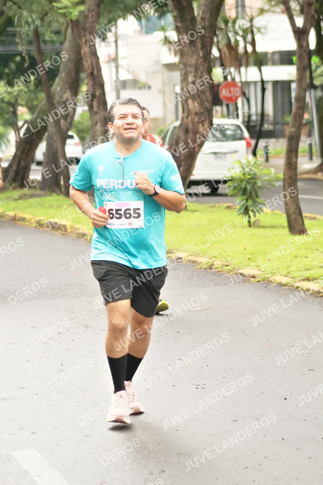 Foto del MEDIO MARATÓN ATLAS en Av. Patria, frente al Parque El Polvorín, Zapopan a las 08:52 · dorsal 6565