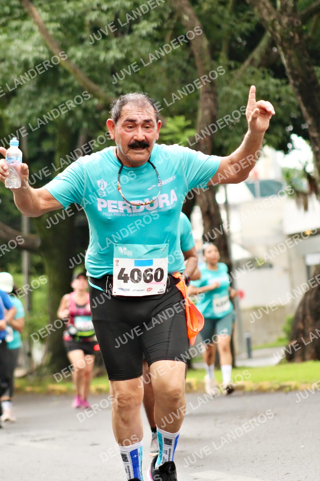 Foto del MEDIO MARATÓN ATLAS en Av. Patria, frente al Parque El Polvorín, Zapopan a las 08:43 · dorsal 4060