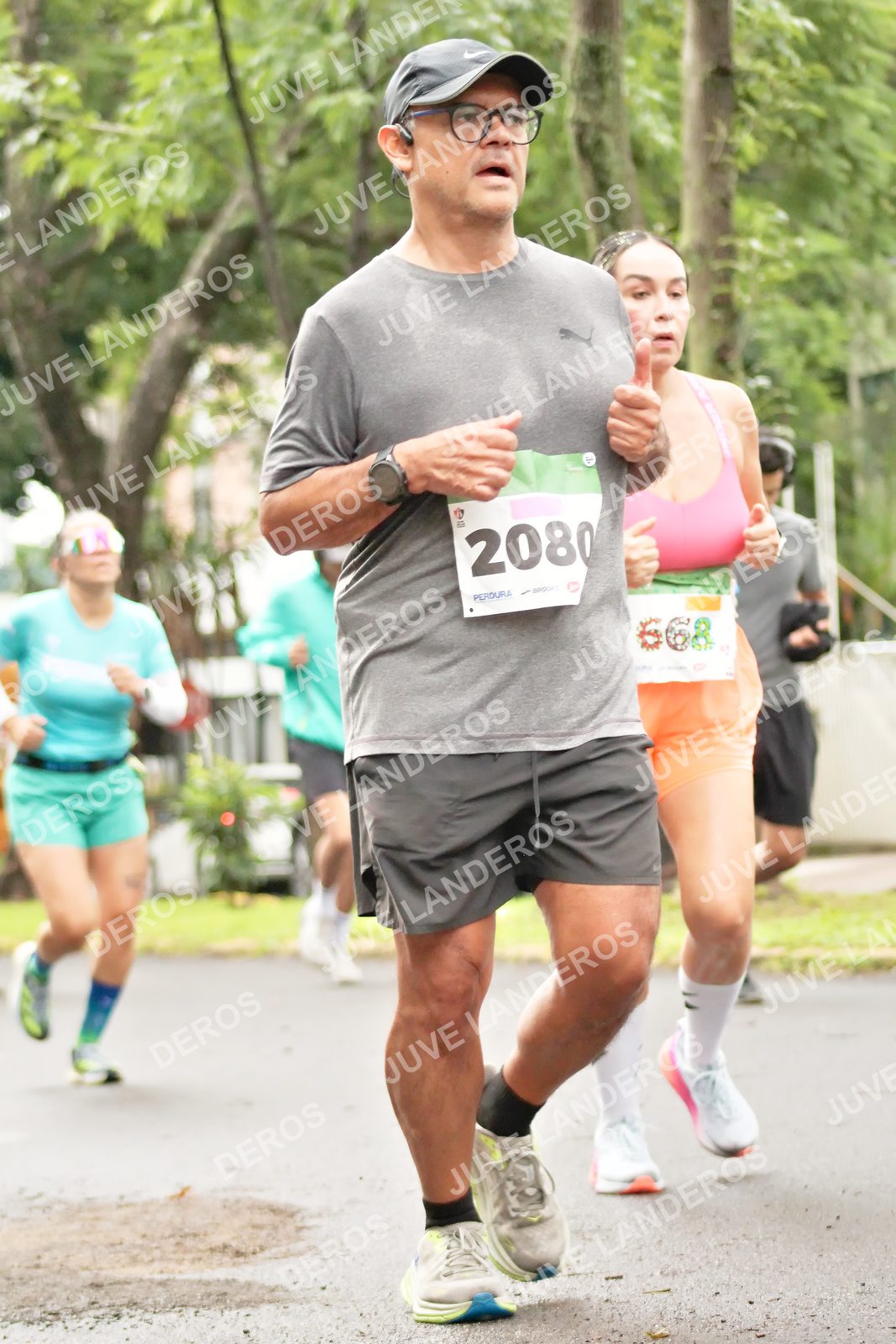 Foto del MEDIO MARATÓN ATLAS en Av. Patria, frente al Parque El Polvorín, Zapopan a las 08:42 · dorsal 2080