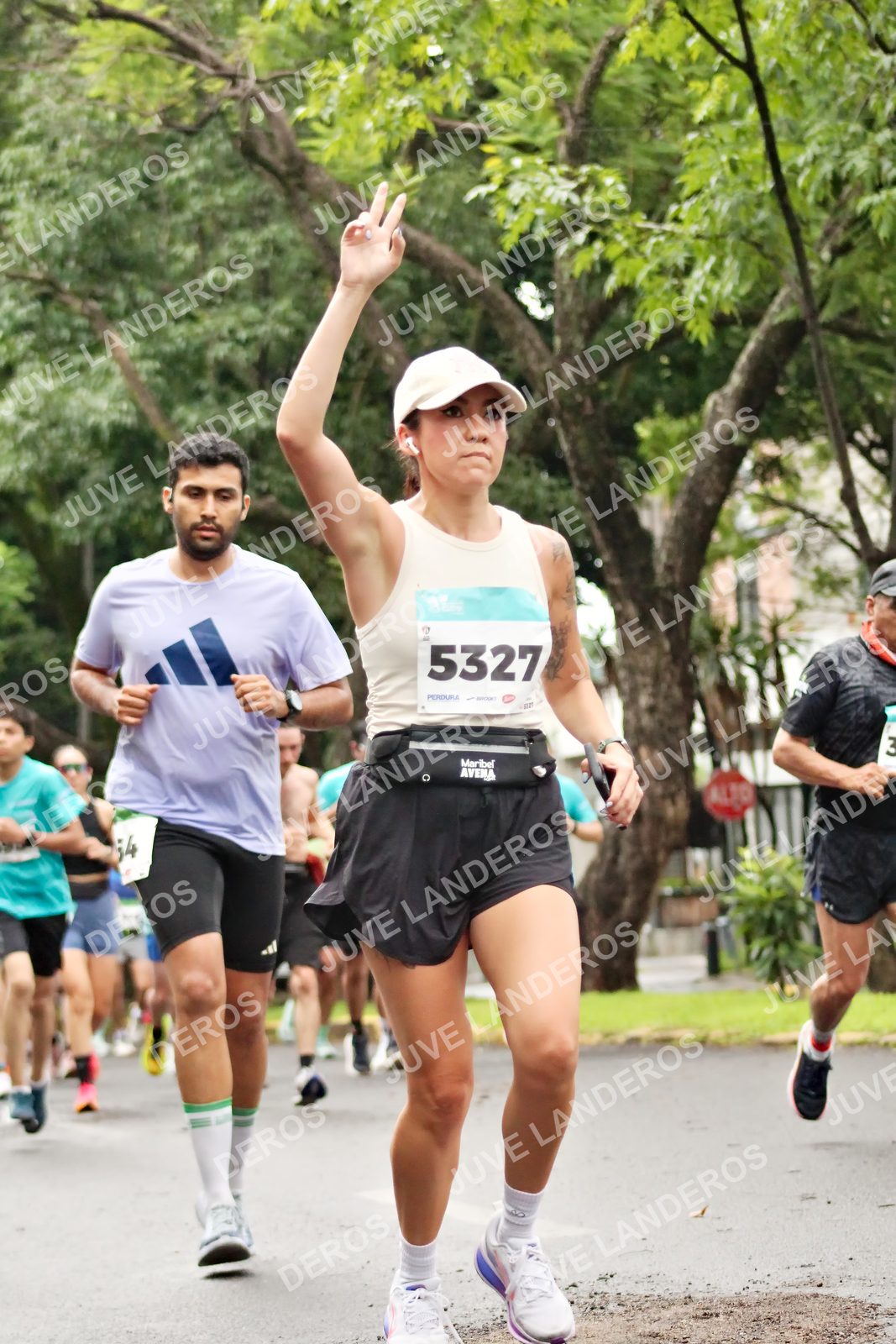 Foto del MEDIO MARATÓN ATLAS en Av. Patria, frente al Parque El Polvorín, Zapopan a las 08:25 · dorsal 5327, 3