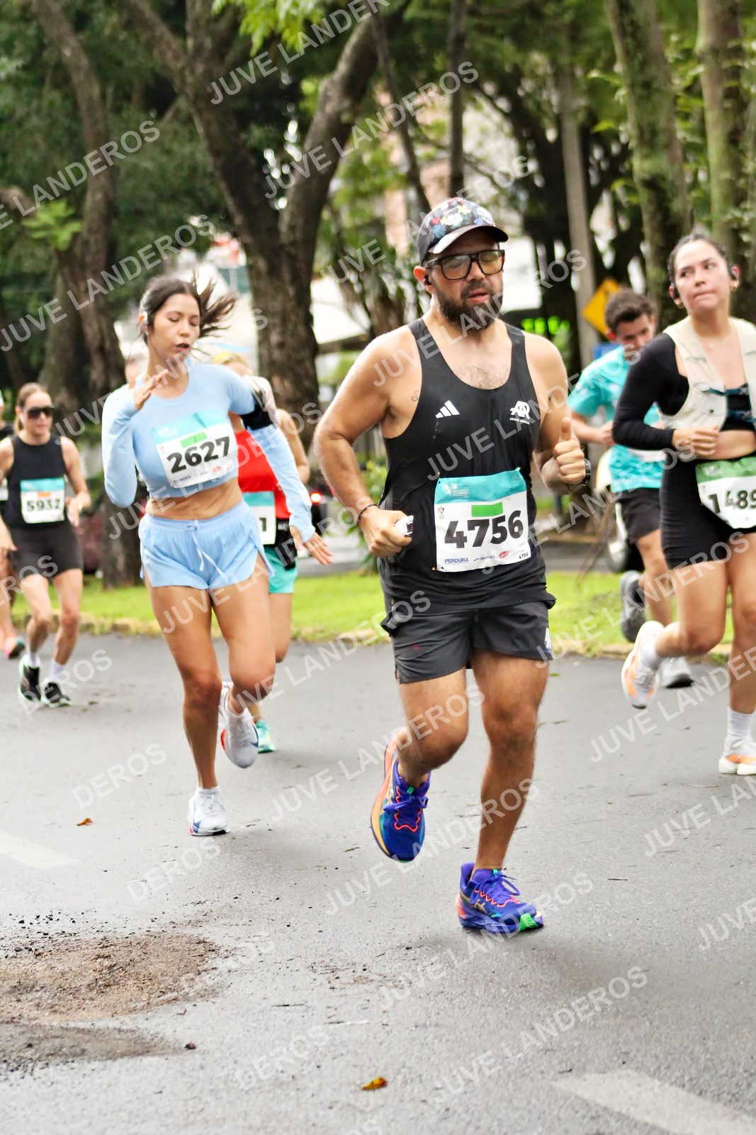 Foto del MEDIO MARATÓN ATLAS en Av. Patria, frente al Parque El Polvorín, Zapopan a las 08:16 · dorsal 4756, 2627, 1, 489