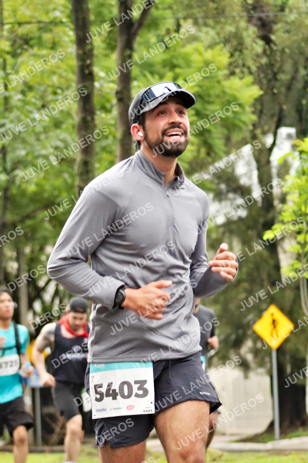 Foto del MEDIO MARATÓN ATLAS en Av. Patria, frente al Parque El Polvorín, Zapopan a las 08:22 · dorsal 5403