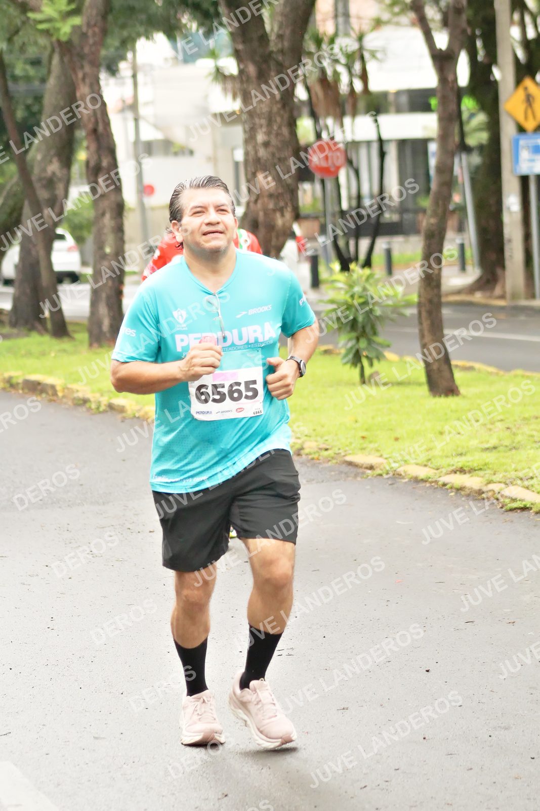Foto del MEDIO MARATÓN ATLAS en Av. Patria, frente al Parque El Polvorín, Zapopan a las 08:52 · dorsal 6565