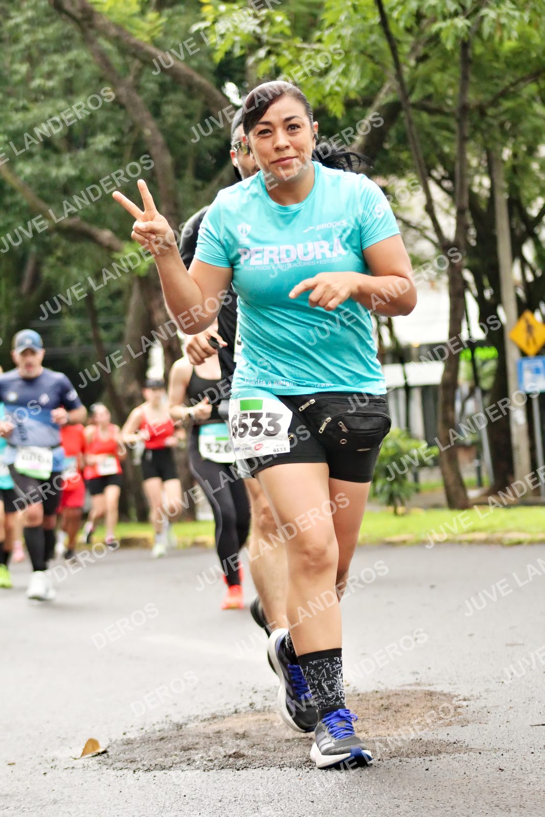 Foto del MEDIO MARATÓN ATLAS en Av. Patria, frente al Parque El Polvorín, Zapopan a las 08:33 · dorsal 6533, 326