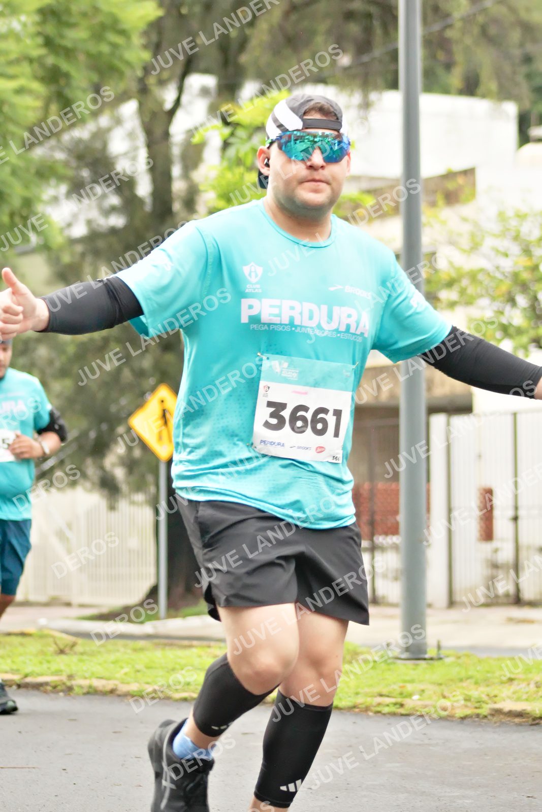 Foto del MEDIO MARATÓN ATLAS en Av. Patria, frente al Parque El Polvorín, Zapopan a las 08:43 · dorsal 3661, 5