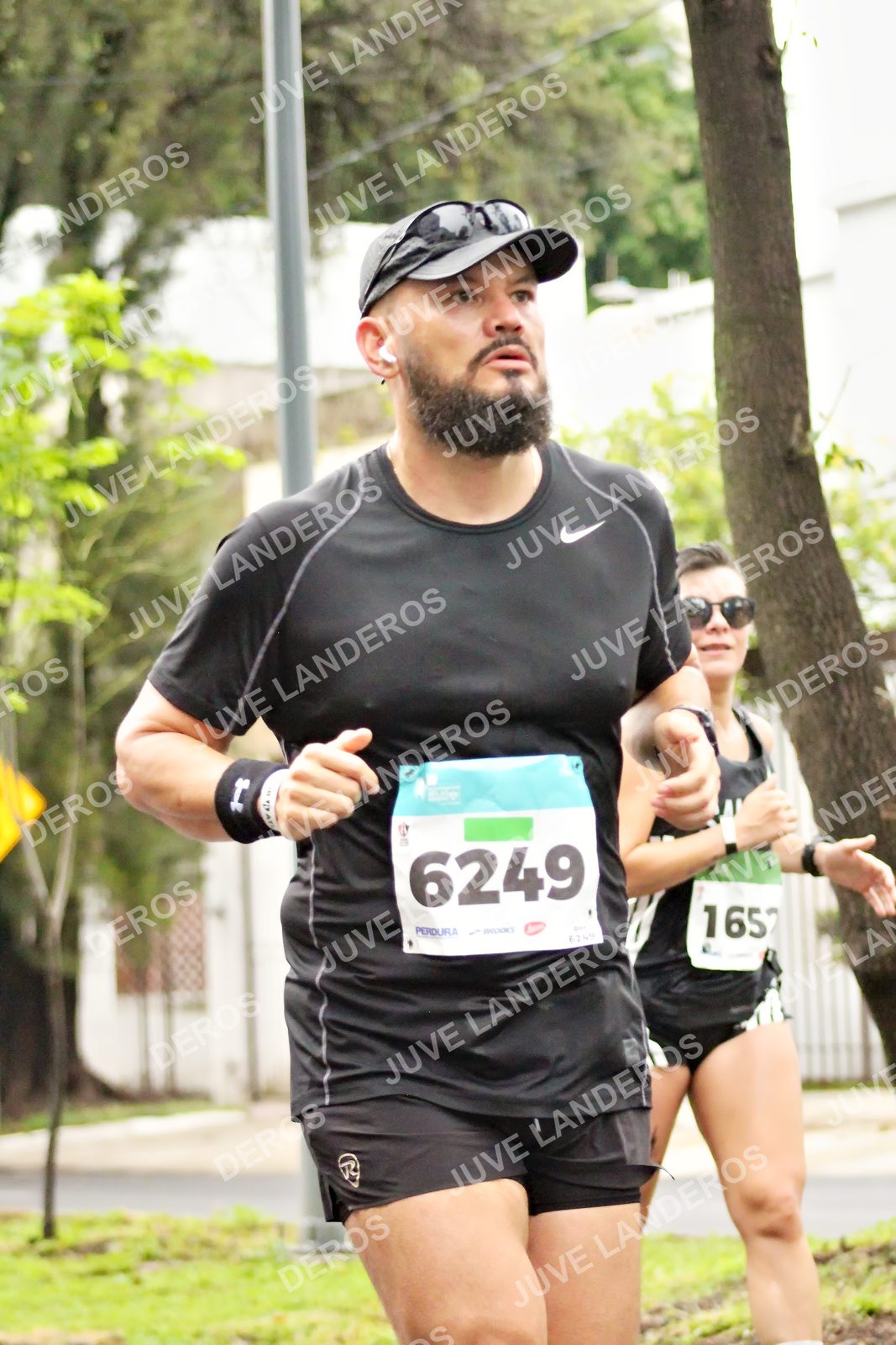 Foto del MEDIO MARATÓN ATLAS en Av. Patria, frente al Parque El Polvorín, Zapopan a las 08:18 · dorsal 6249, 6244
