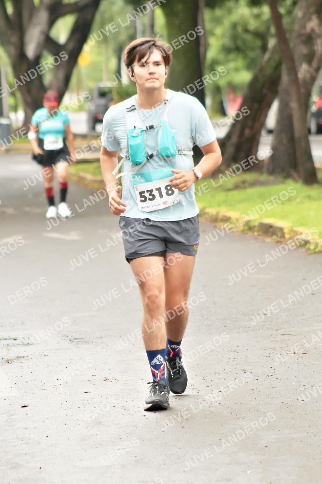 Foto del MEDIO MARATÓN ATLAS en Av. Patria, frente al Parque El Polvorín, Zapopan a las 09:10 · dorsal 5318