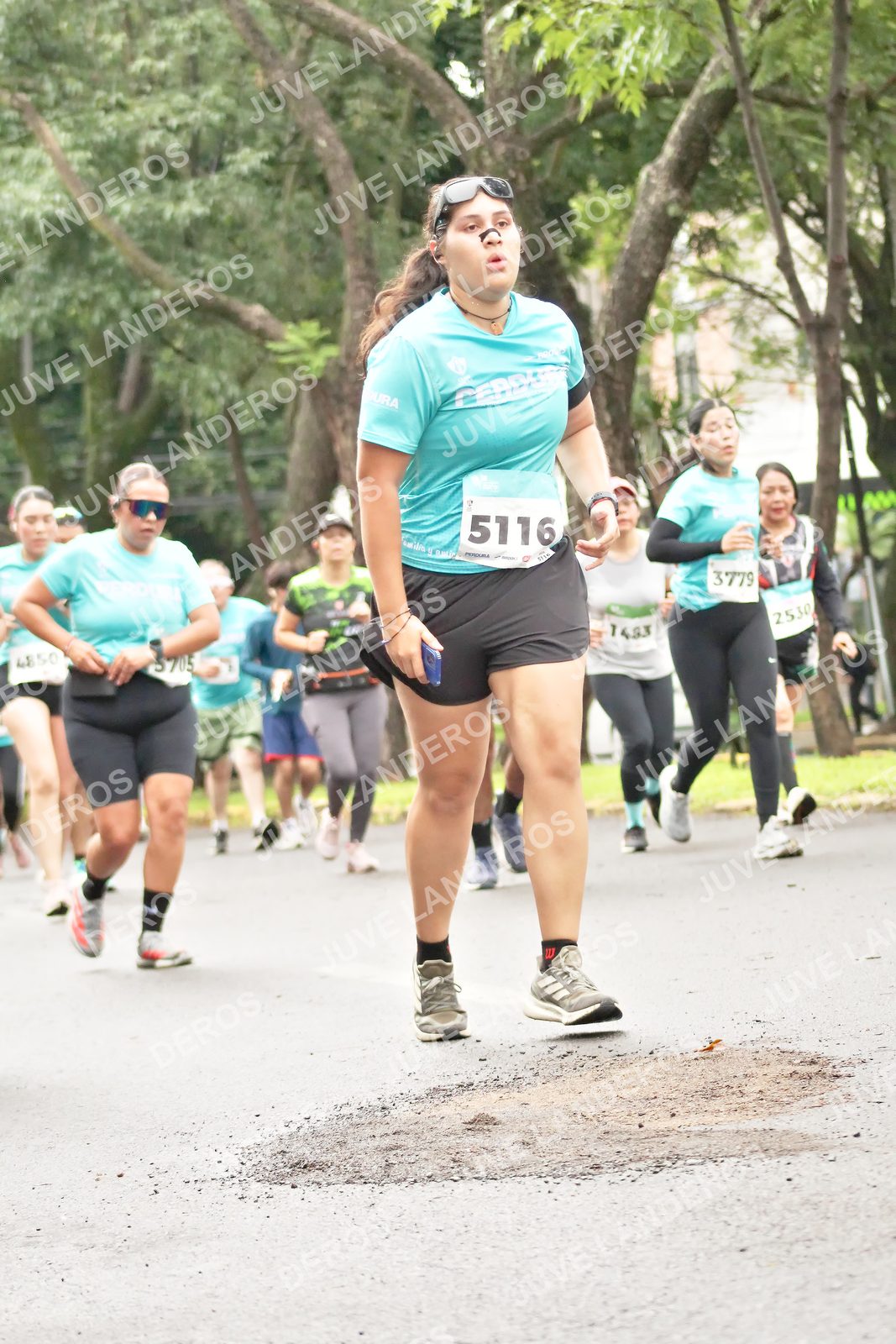 Foto del MEDIO MARATÓN ATLAS en Av. Patria, frente al Parque El Polvorín, Zapopan a las 08:44 · dorsal 5116, 3779, 2530, 5705