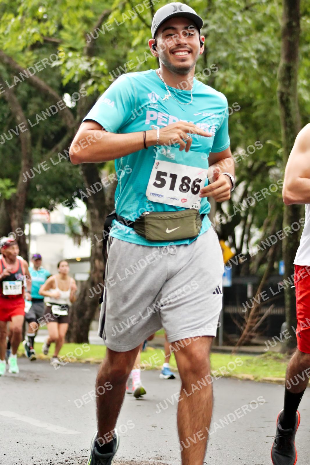 Foto del MEDIO MARATÓN ATLAS en Av. Patria, frente al Parque El Polvorín, Zapopan a las 08:27 · dorsal 5186