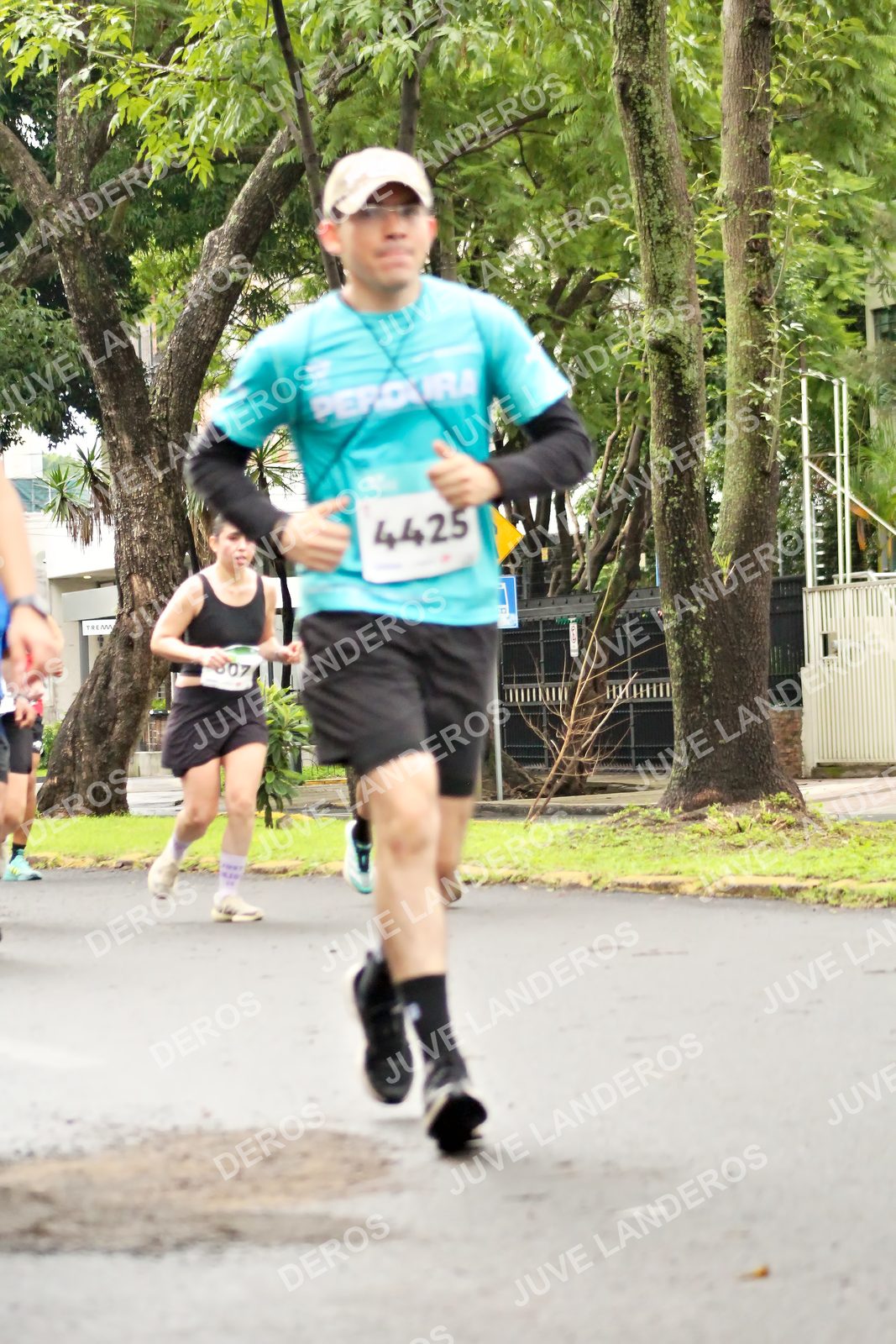 Foto del MEDIO MARATÓN ATLAS en Av. Patria, frente al Parque El Polvorín, Zapopan a las 08:33 · dorsal 4425