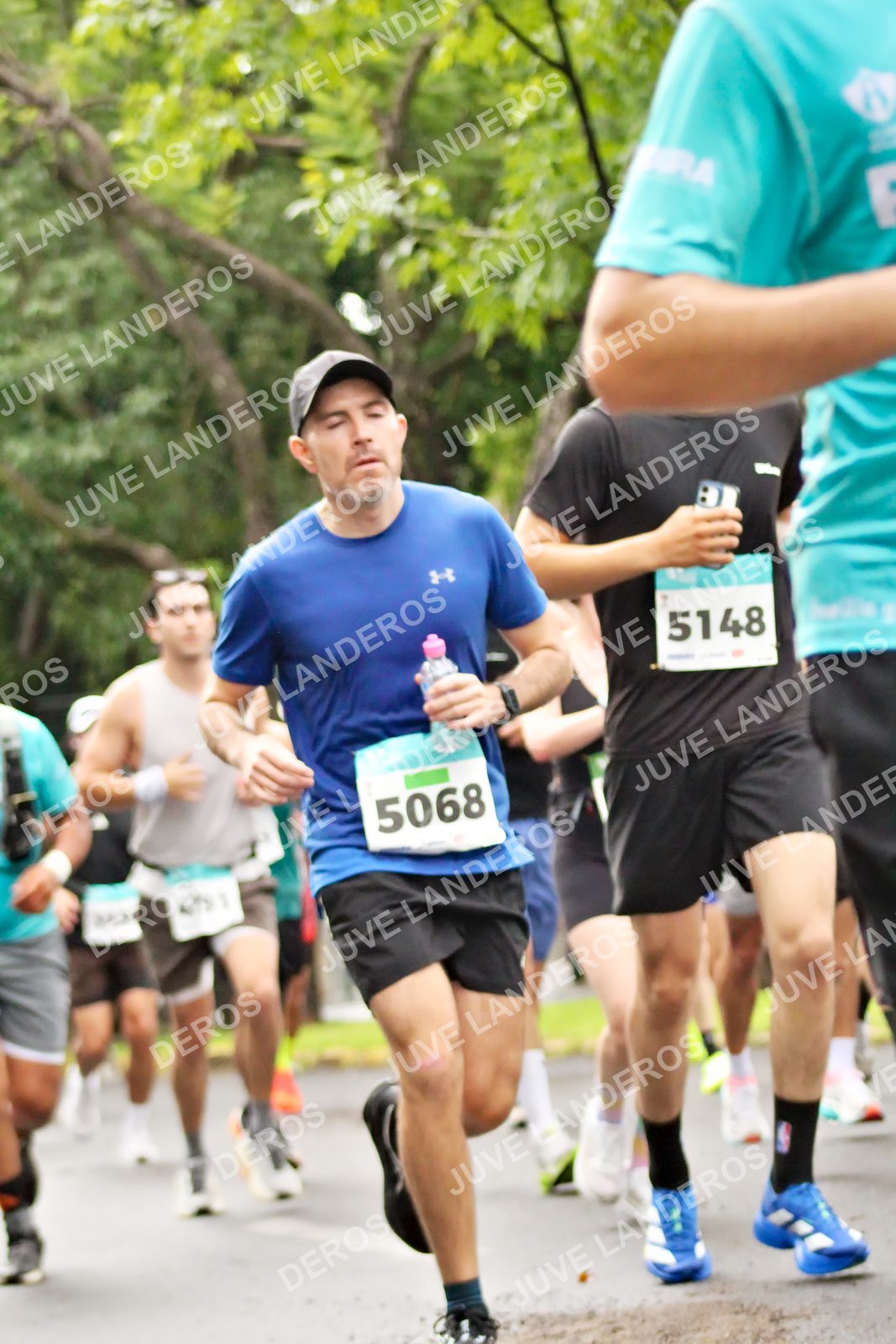 Foto del MEDIO MARATÓN ATLAS en Av. Patria, frente al Parque El Polvorín, Zapopan a las 08:26 · dorsal 5068, 5148