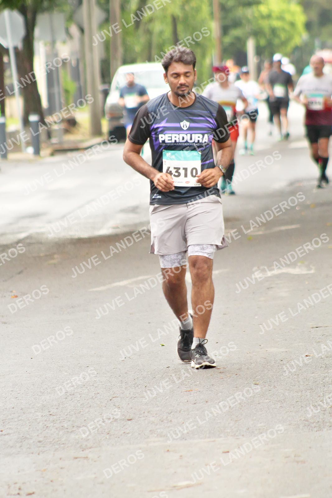 Foto del MEDIO MARATÓN ATLAS en Av. Patria, frente al Parque El Polvorín, Zapopan a las 09:06 · dorsal 4310