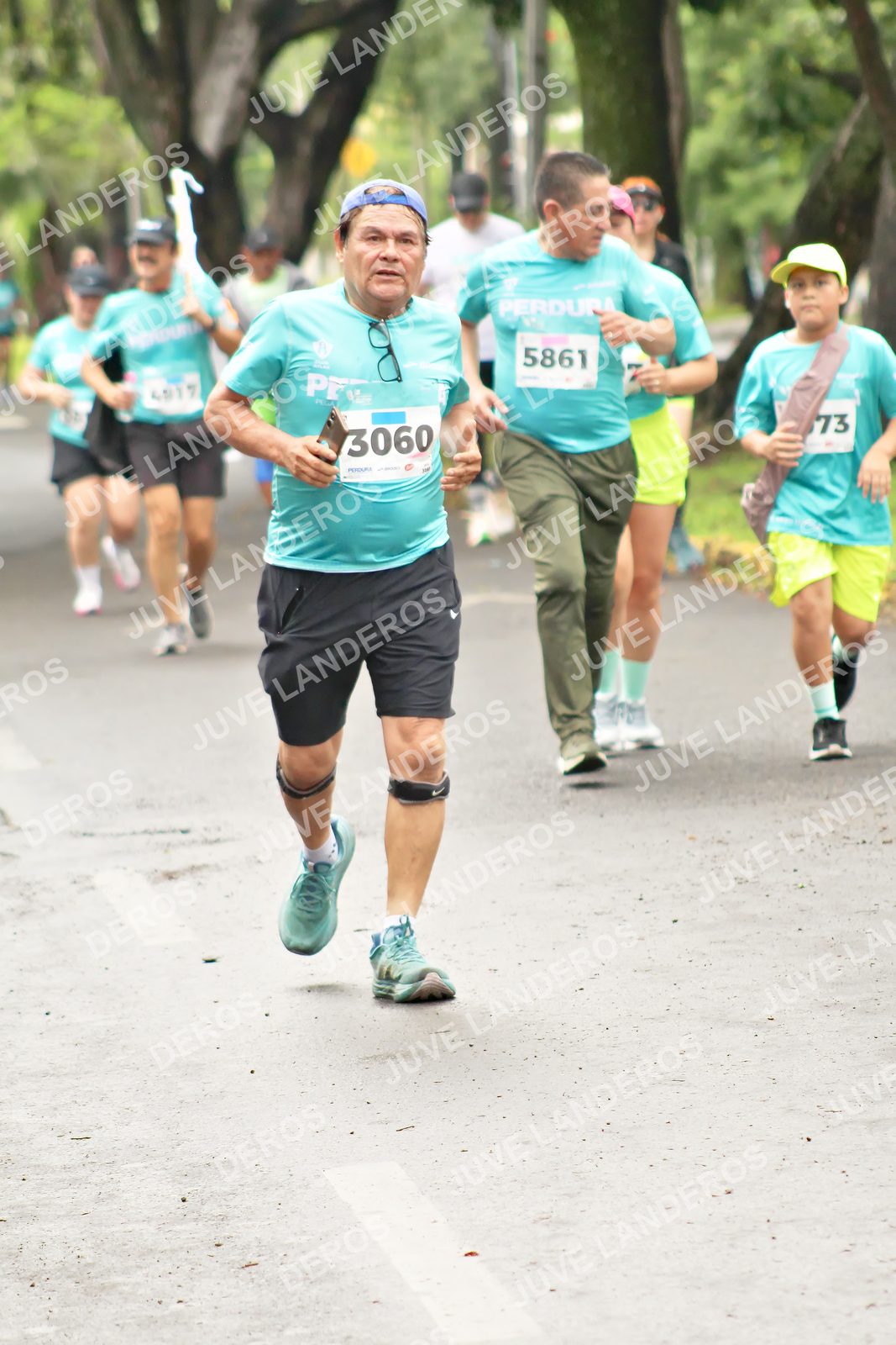 Foto del MEDIO MARATÓN ATLAS en Av. Patria, frente al Parque El Polvorín, Zapopan a las 09:01 · dorsal 3060, 5861, 73, 4917