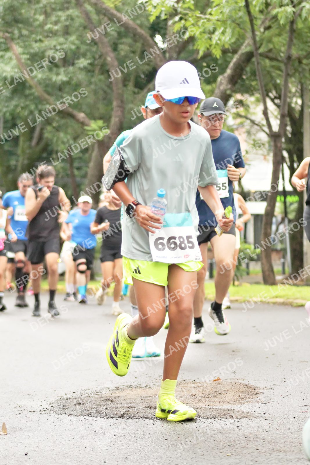 Foto del MEDIO MARATÓN ATLAS en Av. Patria, frente al Parque El Polvorín, Zapopan a las 08:39 · dorsal 6685, 55