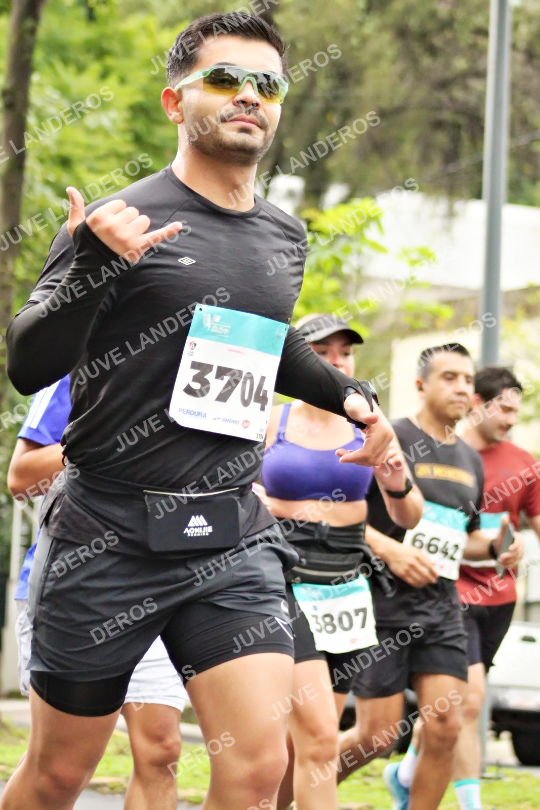 Foto del MEDIO MARATÓN ATLAS en Av. Patria, frente al Parque El Polvorín, Zapopan a las 08:33 · dorsal 3704, 3807, 6642