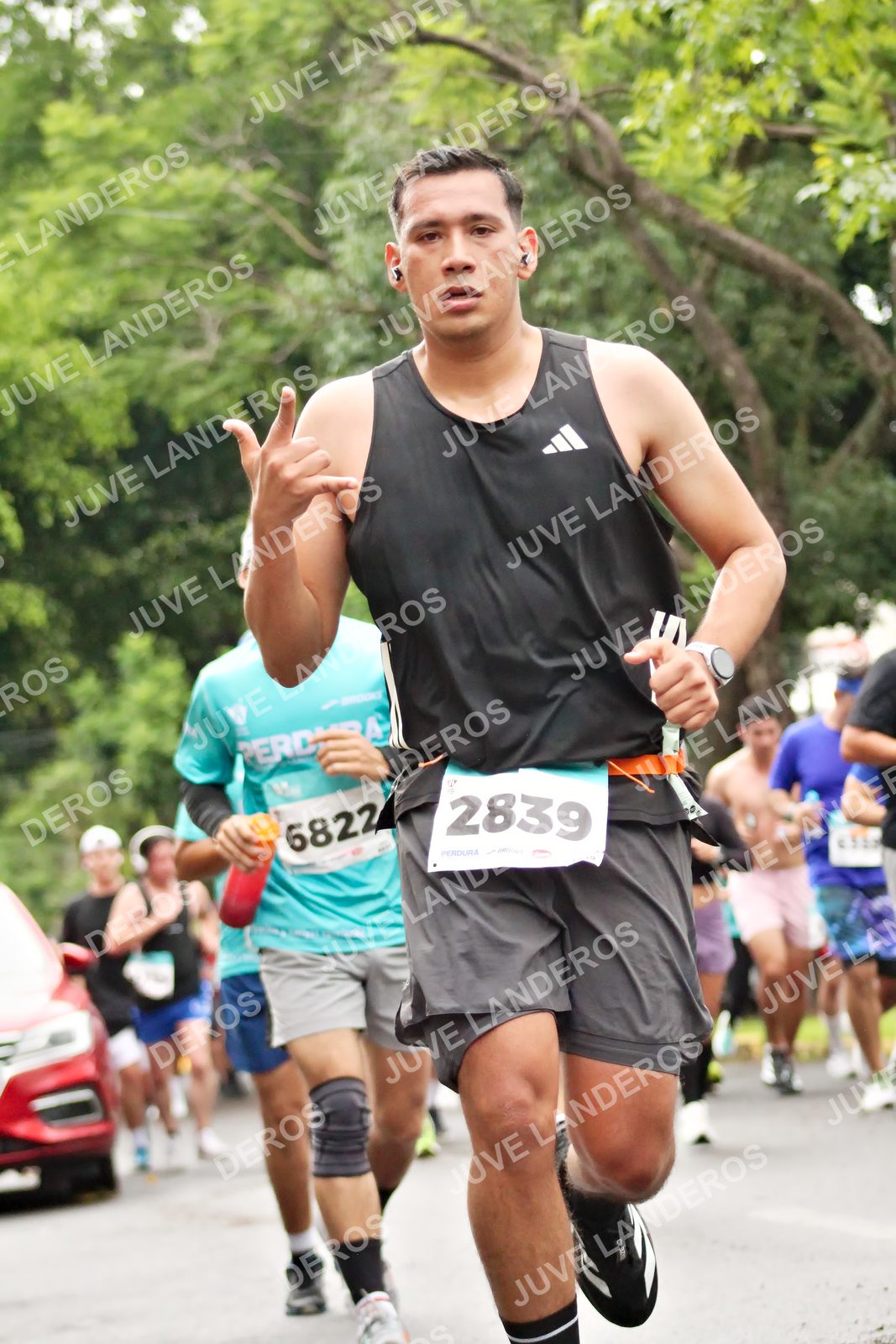 Foto del MEDIO MARATÓN ATLAS en Av. Patria, frente al Parque El Polvorín, Zapopan a las 08:31 · dorsal 2839, 6822