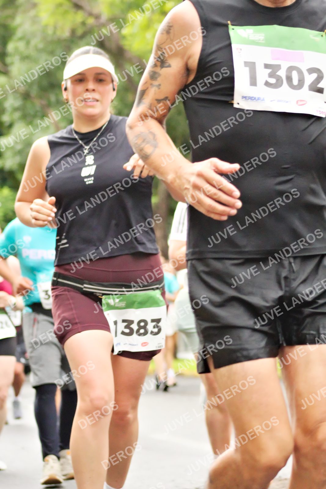 Foto del MEDIO MARATÓN ATLAS en Av. Patria, frente al Parque El Polvorín, Zapopan a las 08:38 · dorsal 1302, 1383, 3